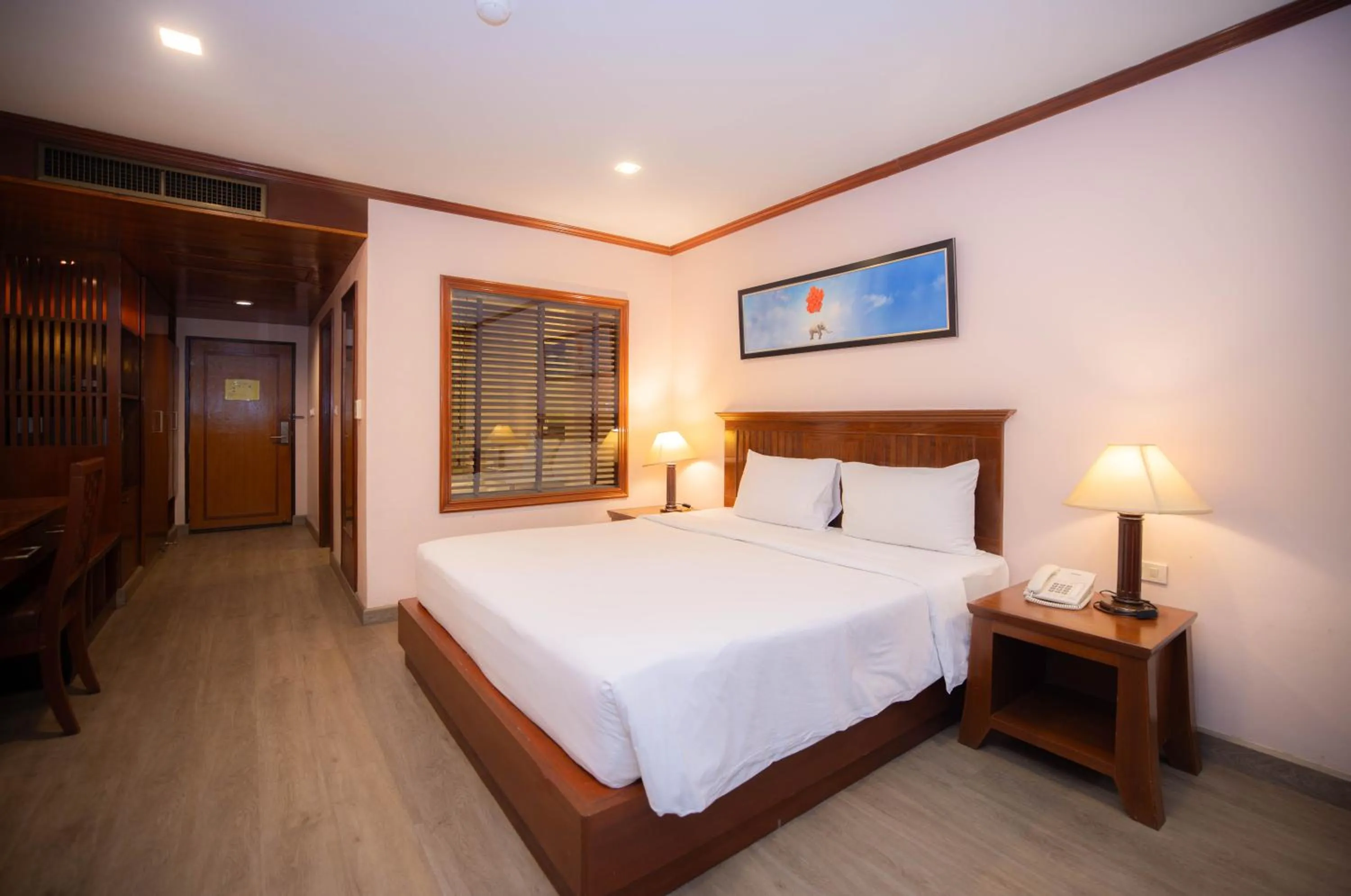 Bed in Baumanburi Hotel Patong