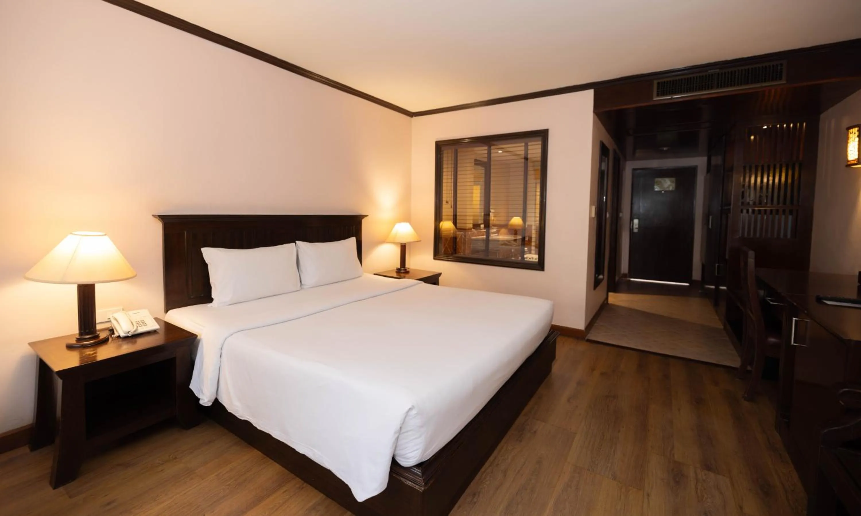 Bed in Baumanburi Hotel Patong