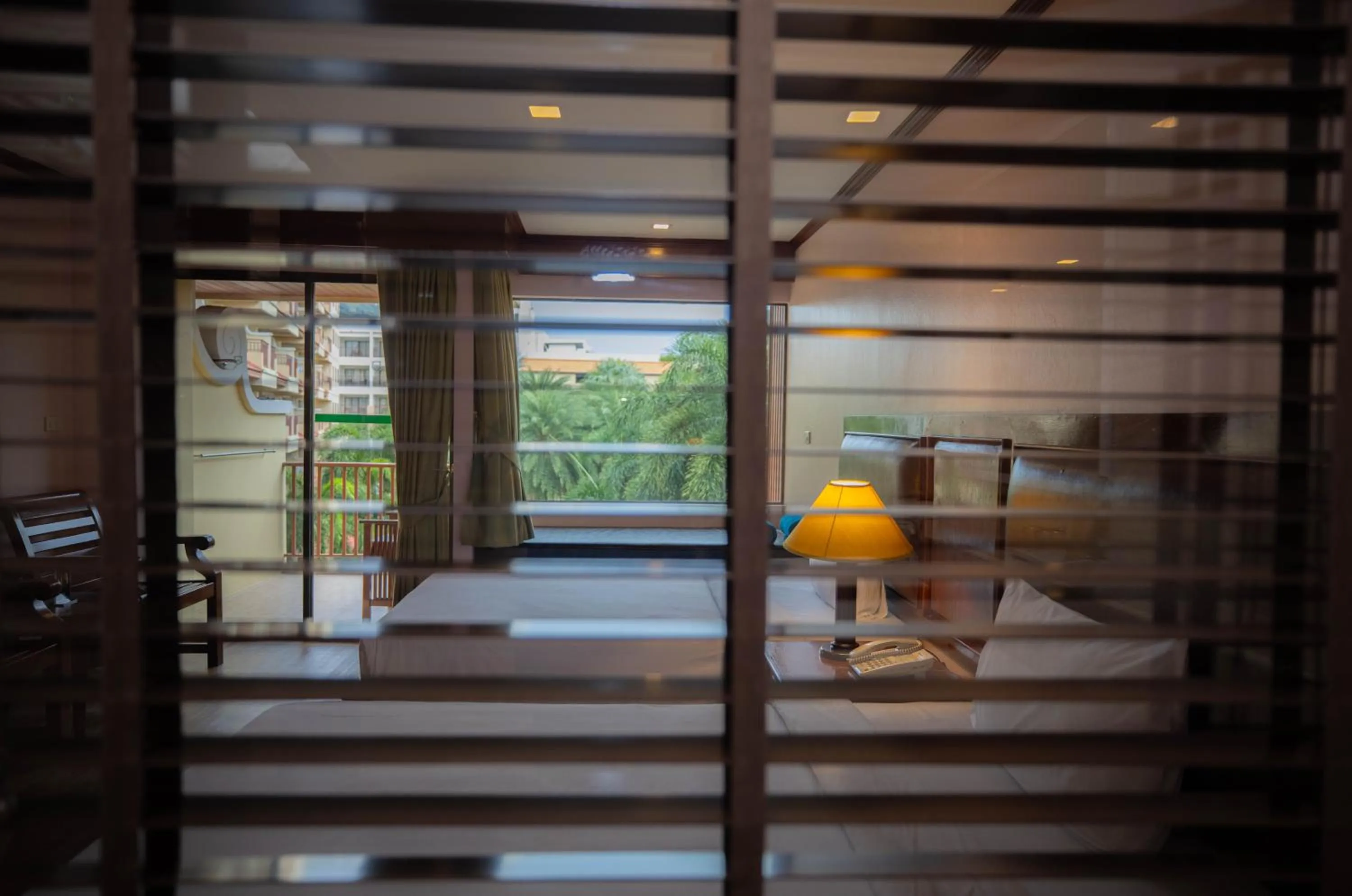 Bed in Baumanburi Hotel Patong