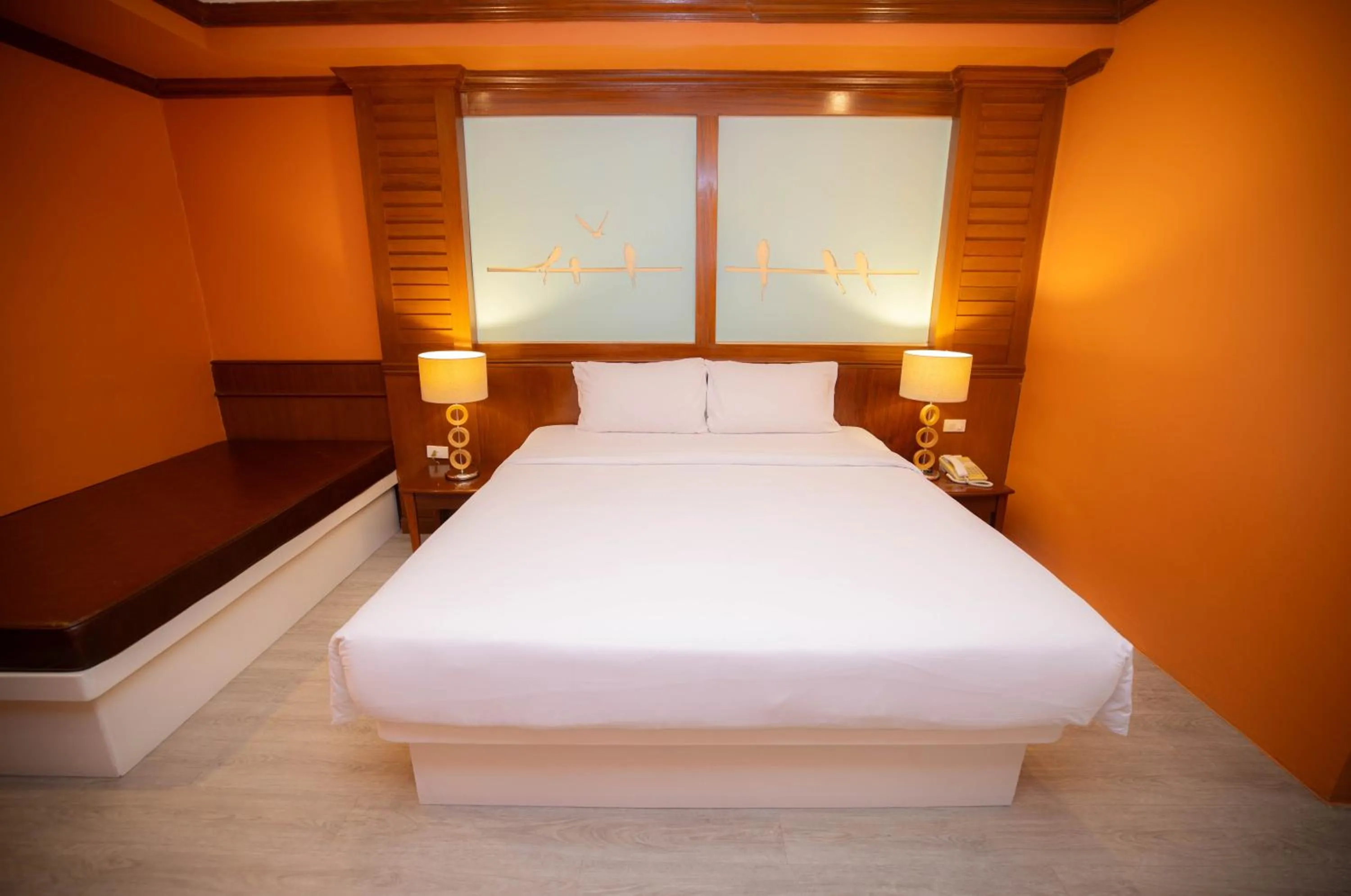 Bed in Baumanburi Hotel Patong