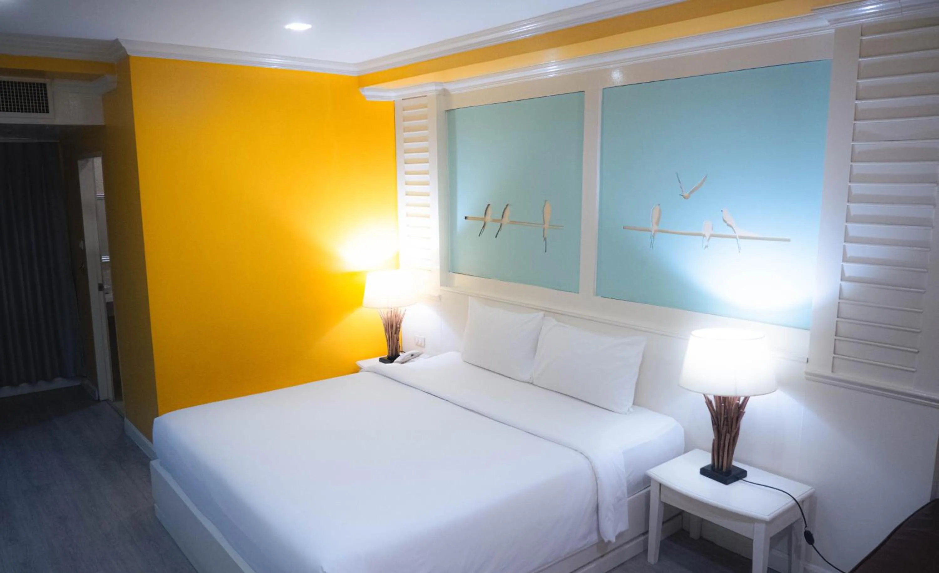 Bed in Baumanburi Hotel Patong