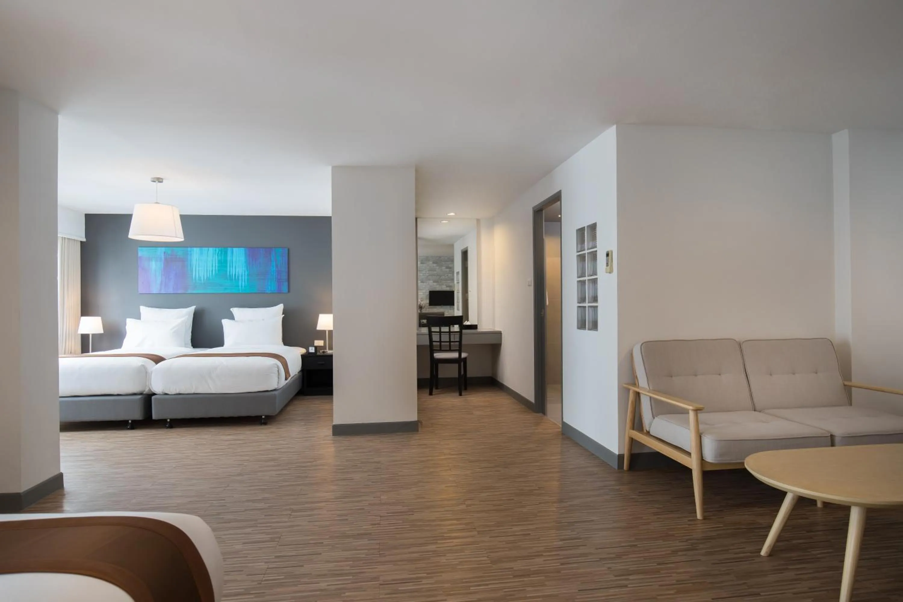 Living room, Bed in Journeyhub Pattaya Central