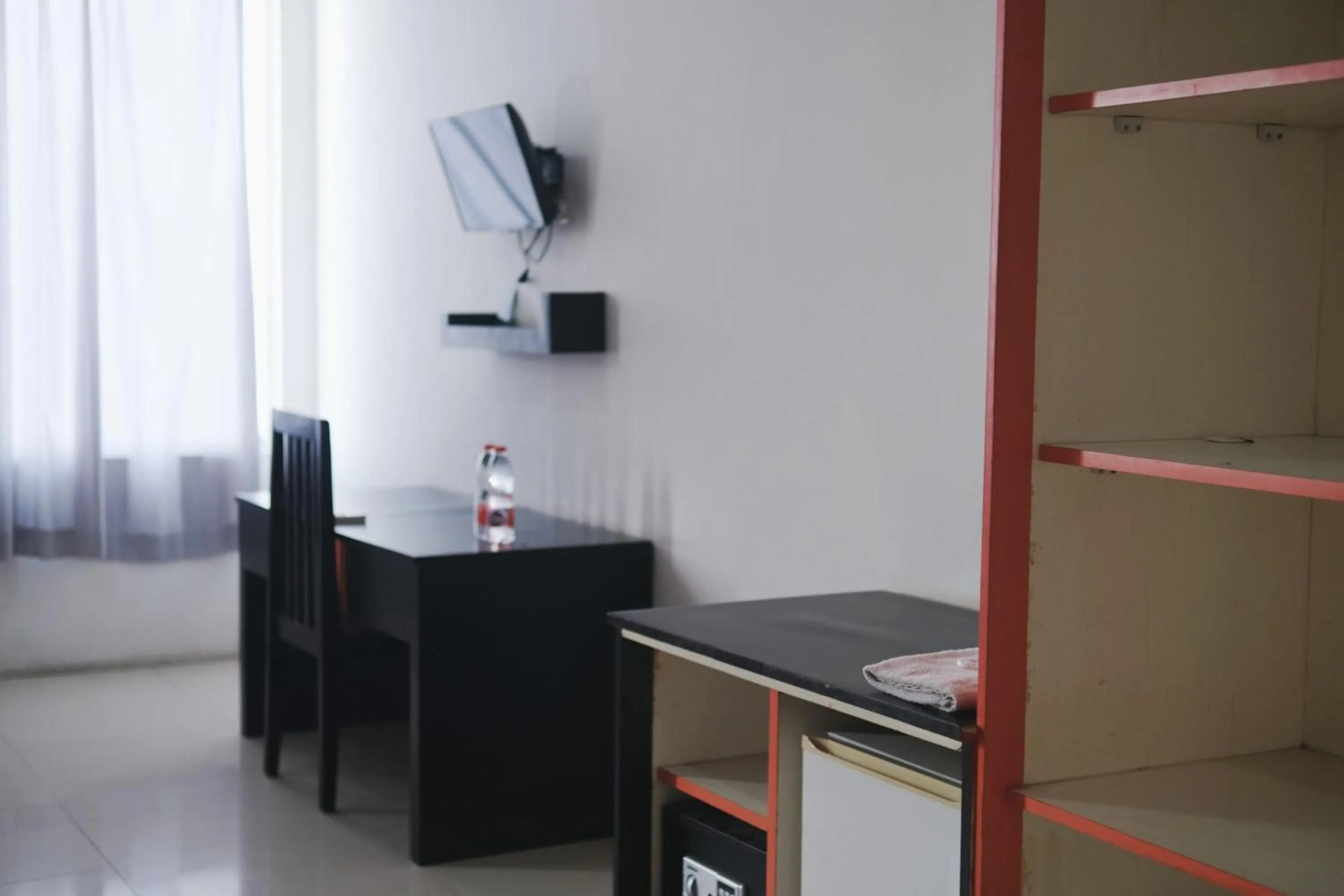 Seating area in Urbanview Hotel Asyra Makassar