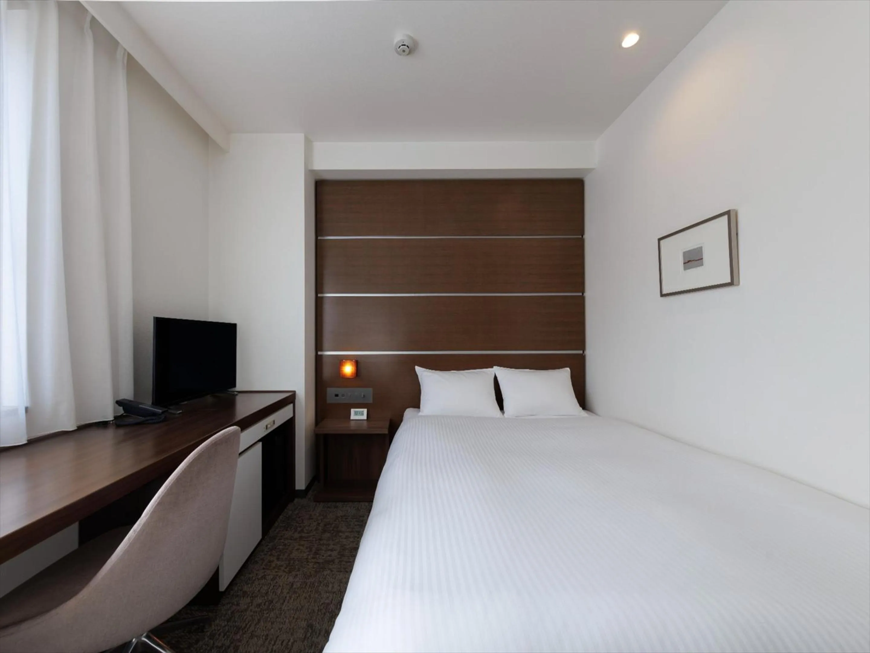 Photo of the whole room, Bed in JR Kyushu Hotel Kagoshima