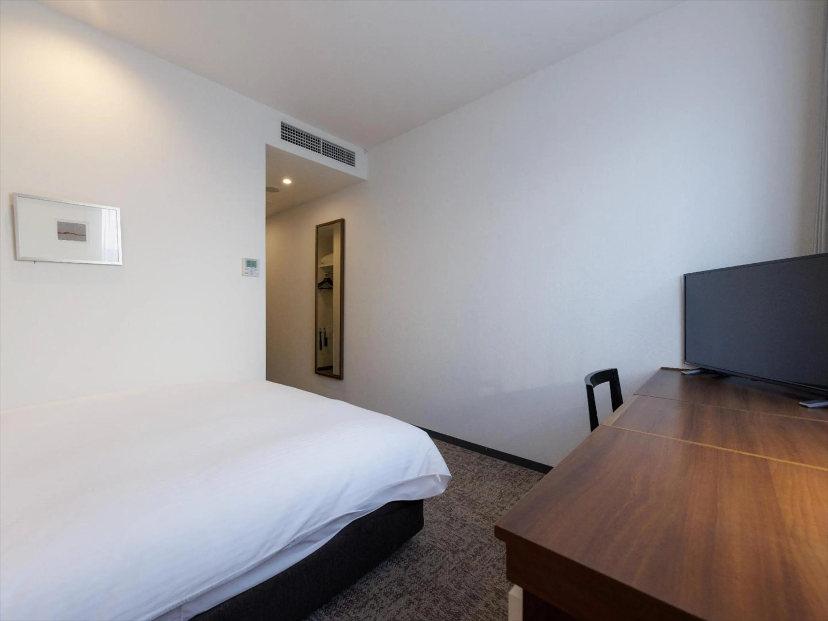 Photo of the whole room, Bed in JR Kyushu Hotel Kagoshima