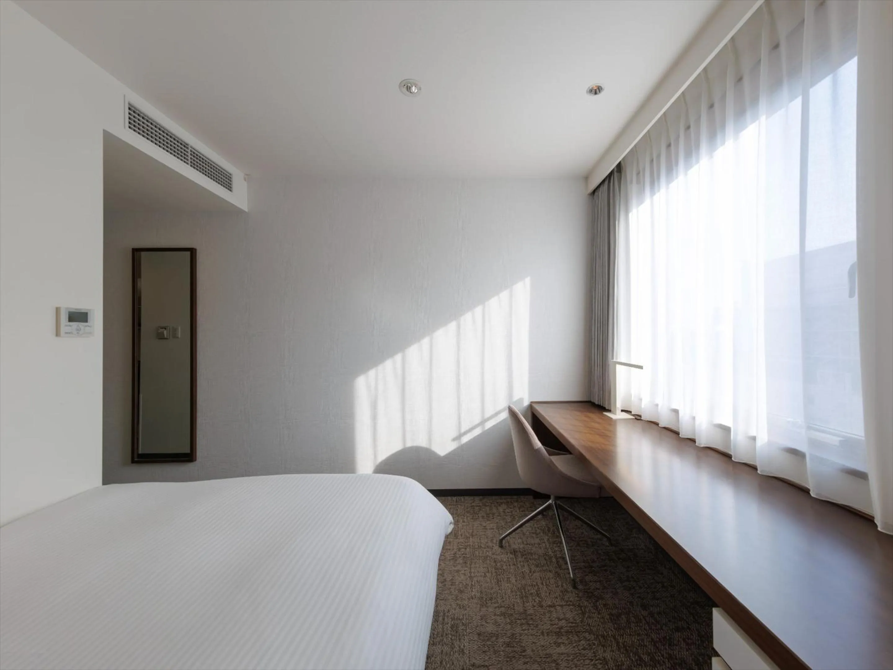 Photo of the whole room, Bed in JR Kyushu Hotel Kagoshima