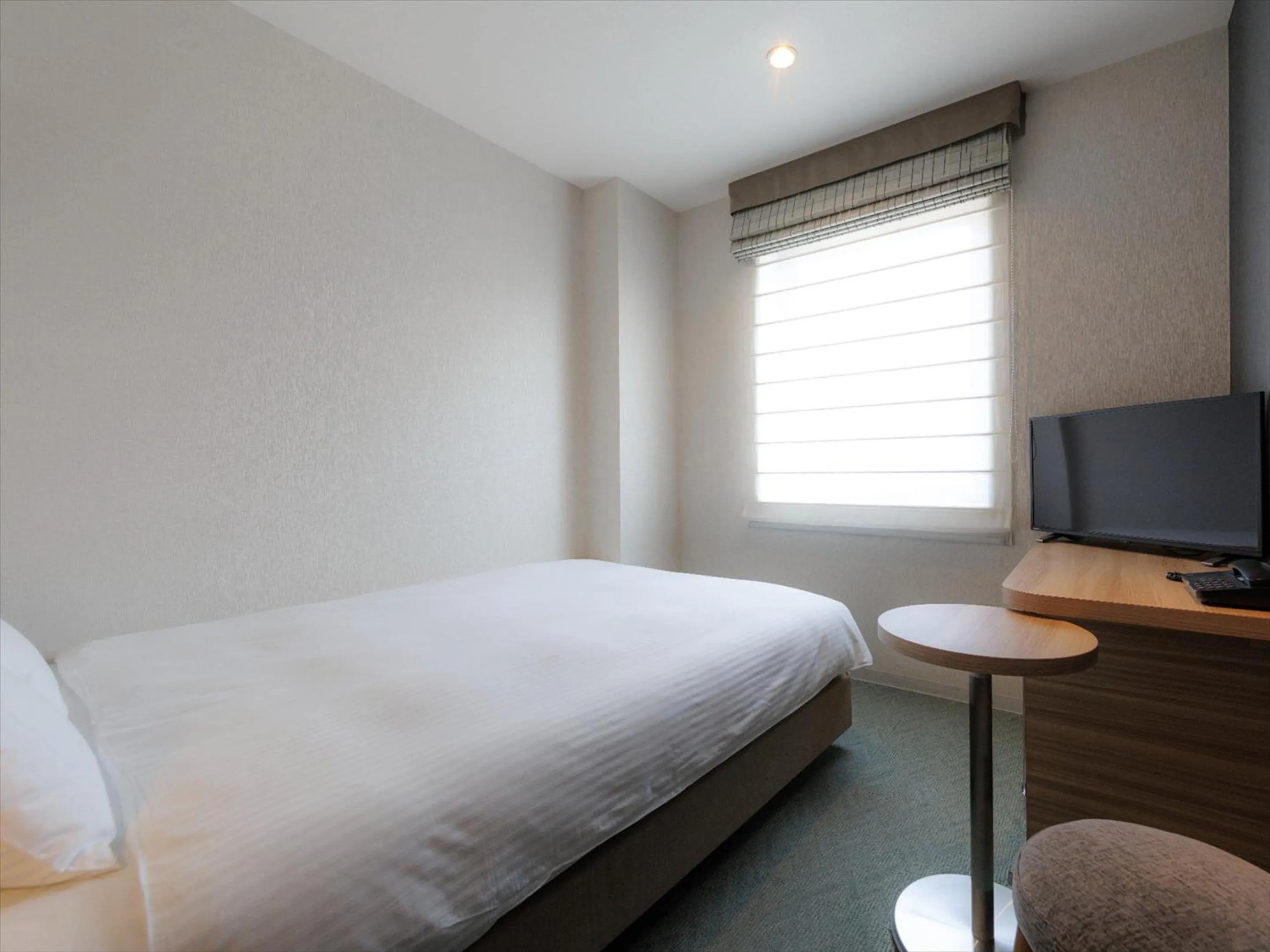 Photo of the whole room, Bed in JR Kyushu Hotel Kagoshima