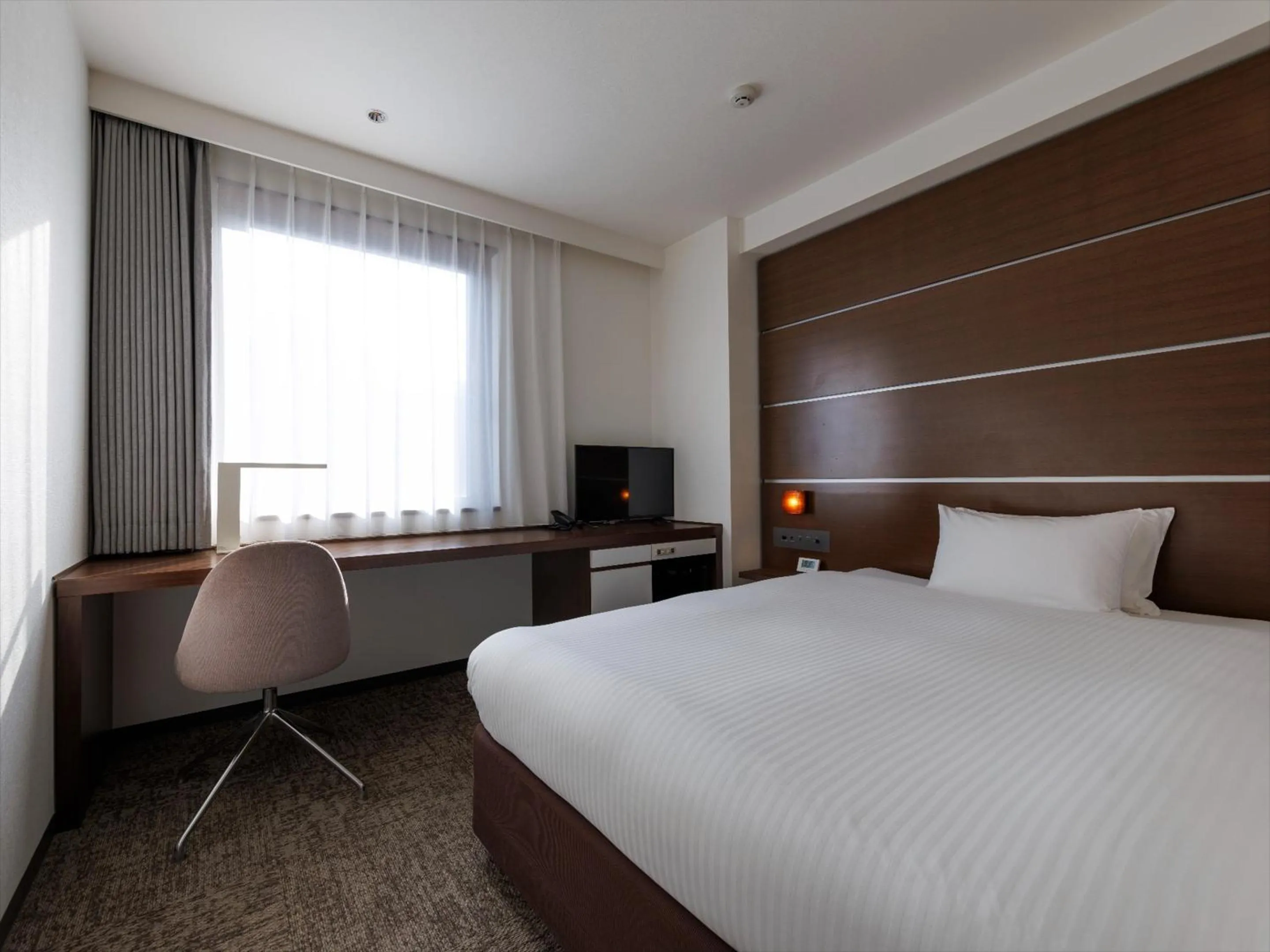 Photo of the whole room, Bed in JR Kyushu Hotel Kagoshima