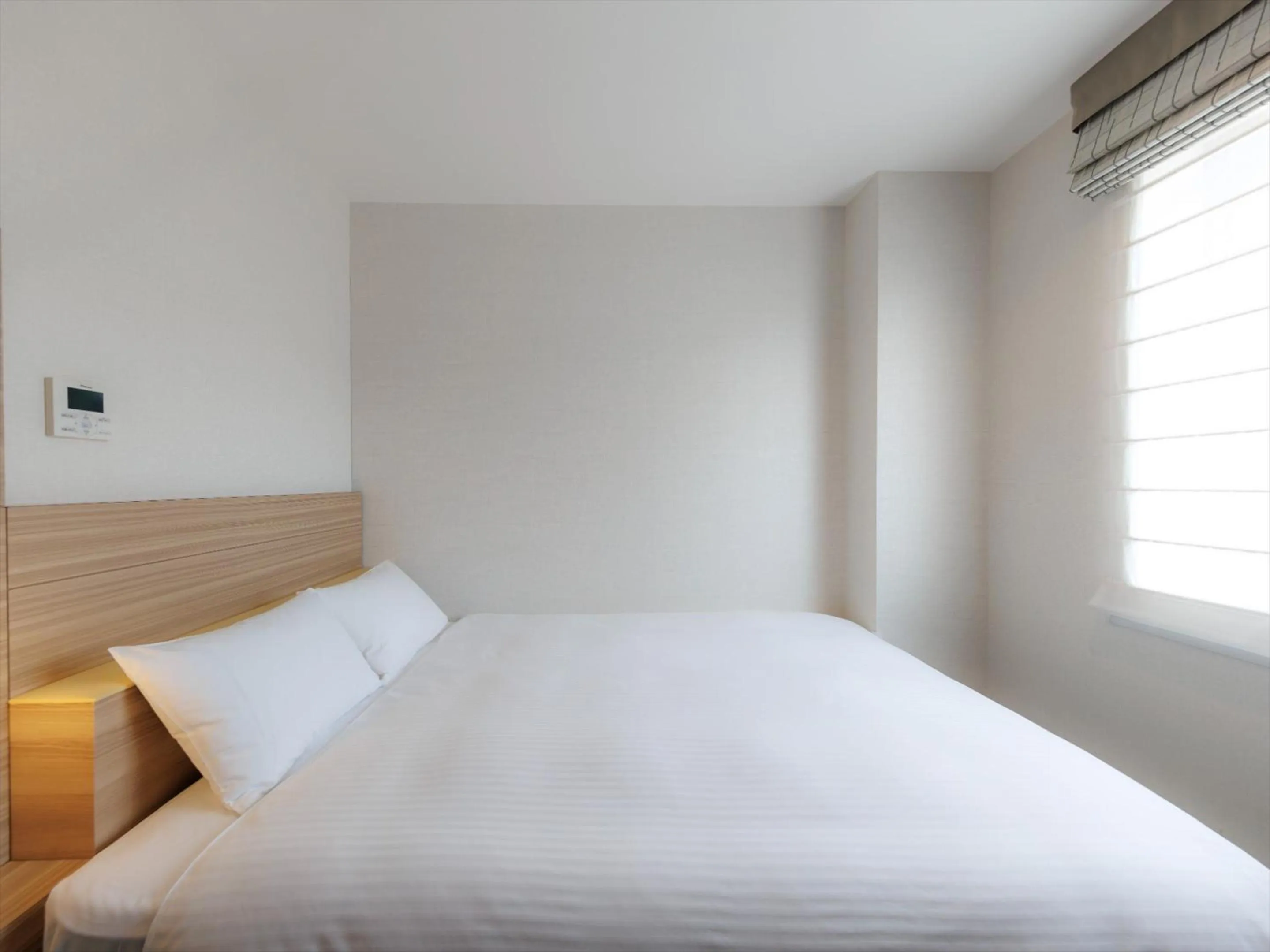 Photo of the whole room, Bed in JR Kyushu Hotel Kagoshima