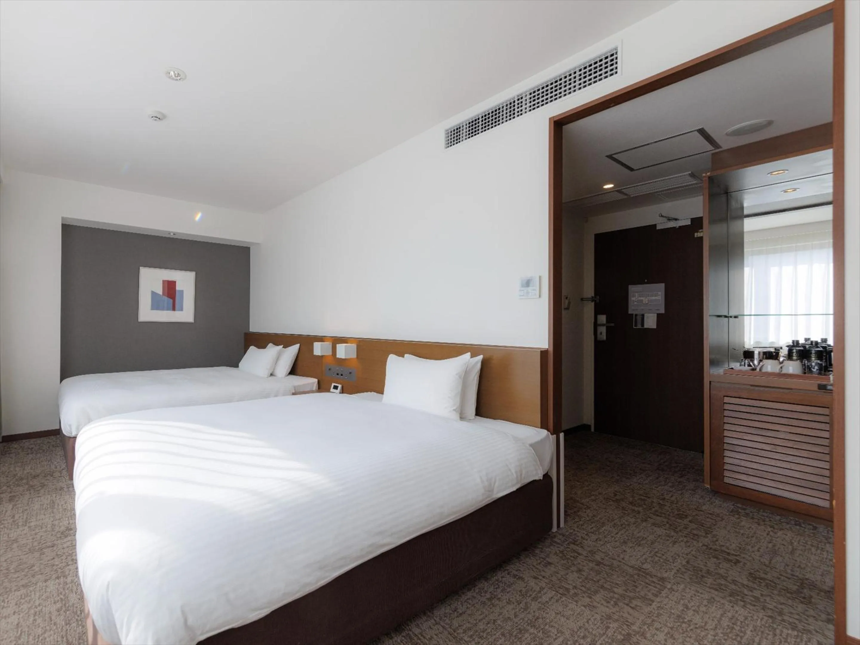 Photo of the whole room, Bed in JR Kyushu Hotel Kagoshima