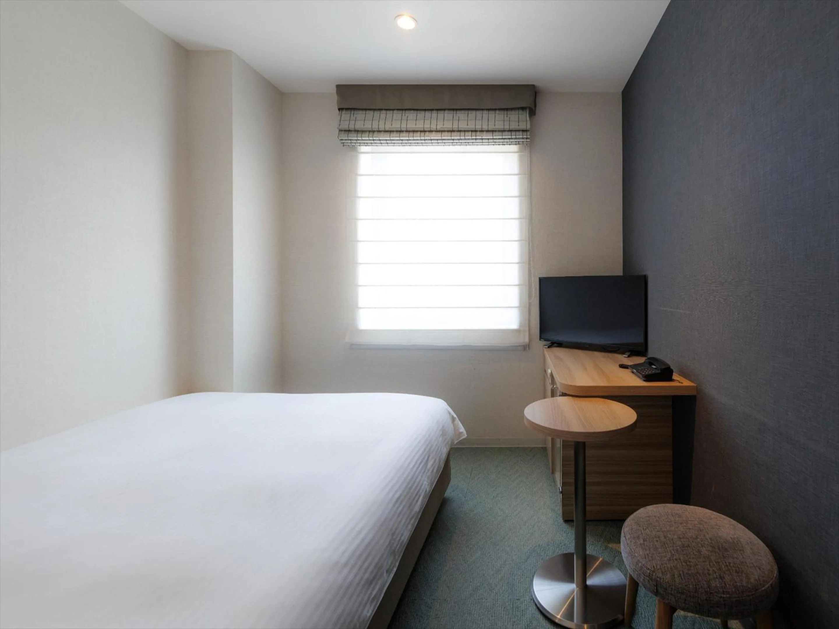 Photo of the whole room, Bed in JR Kyushu Hotel Kagoshima