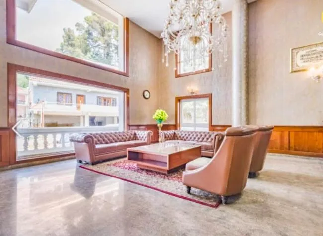 Communal lounge/ TV room in The Majestic Crown