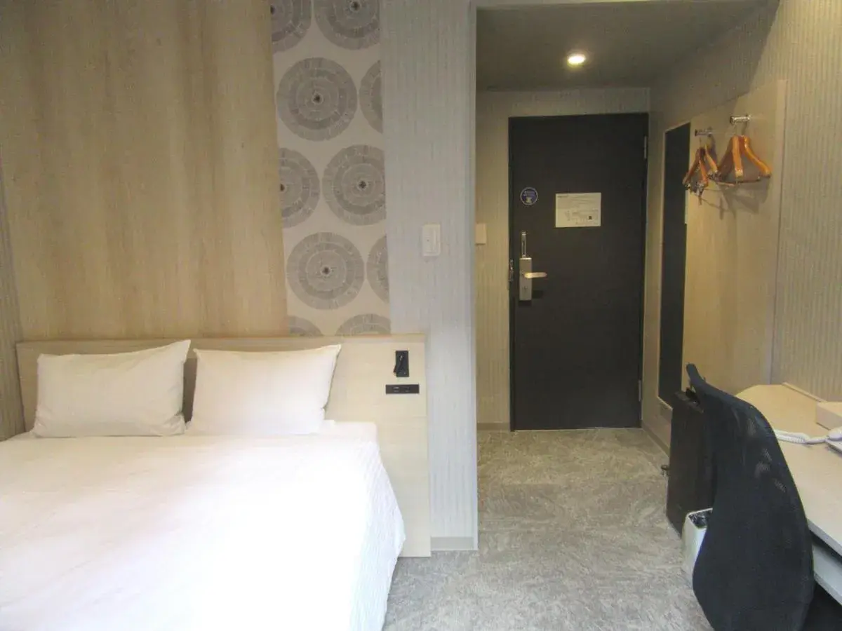 Bed in Smile Hotel Hachinohe Bed in Smile Hotel Hachinohe