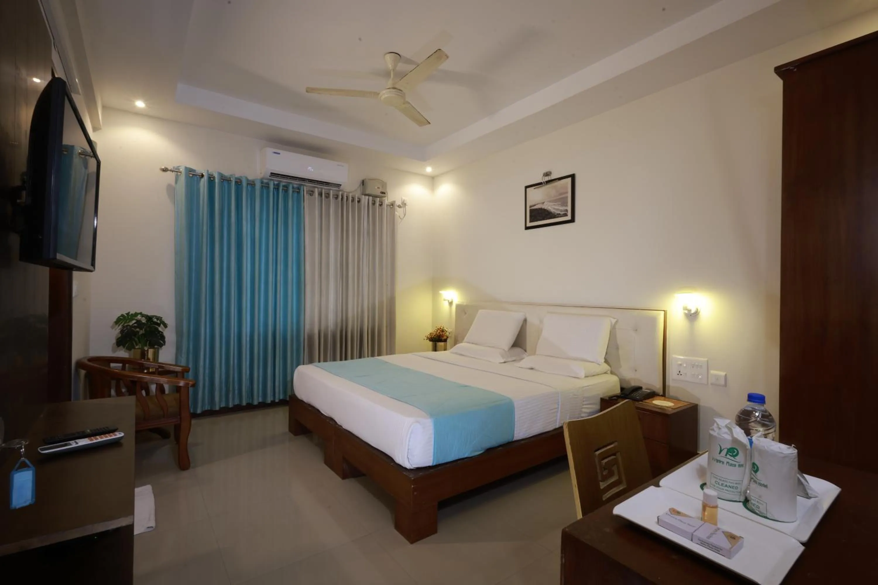 Bed in Metro Plaza Hotel by RAK Rooms, Mangaluru