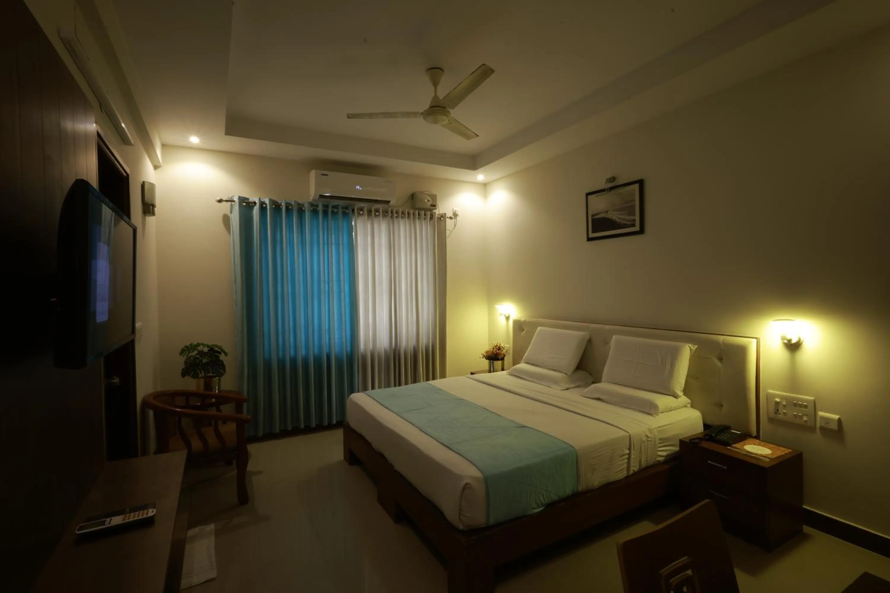 Bed in Metro Plaza Hotel by RAK Rooms, Mangaluru