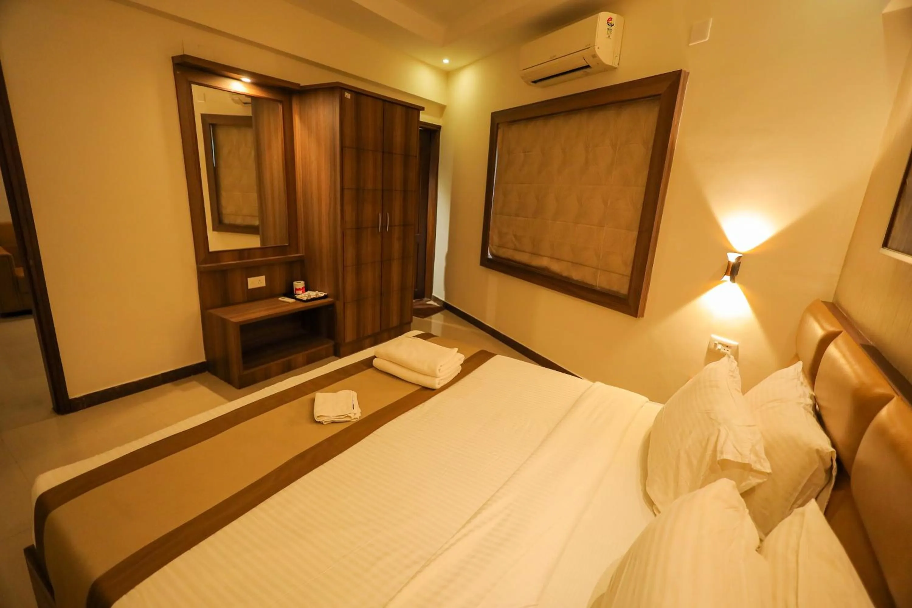 Bedroom, Bed in Metro Plaza Hotel by RAK Rooms, Mangaluru