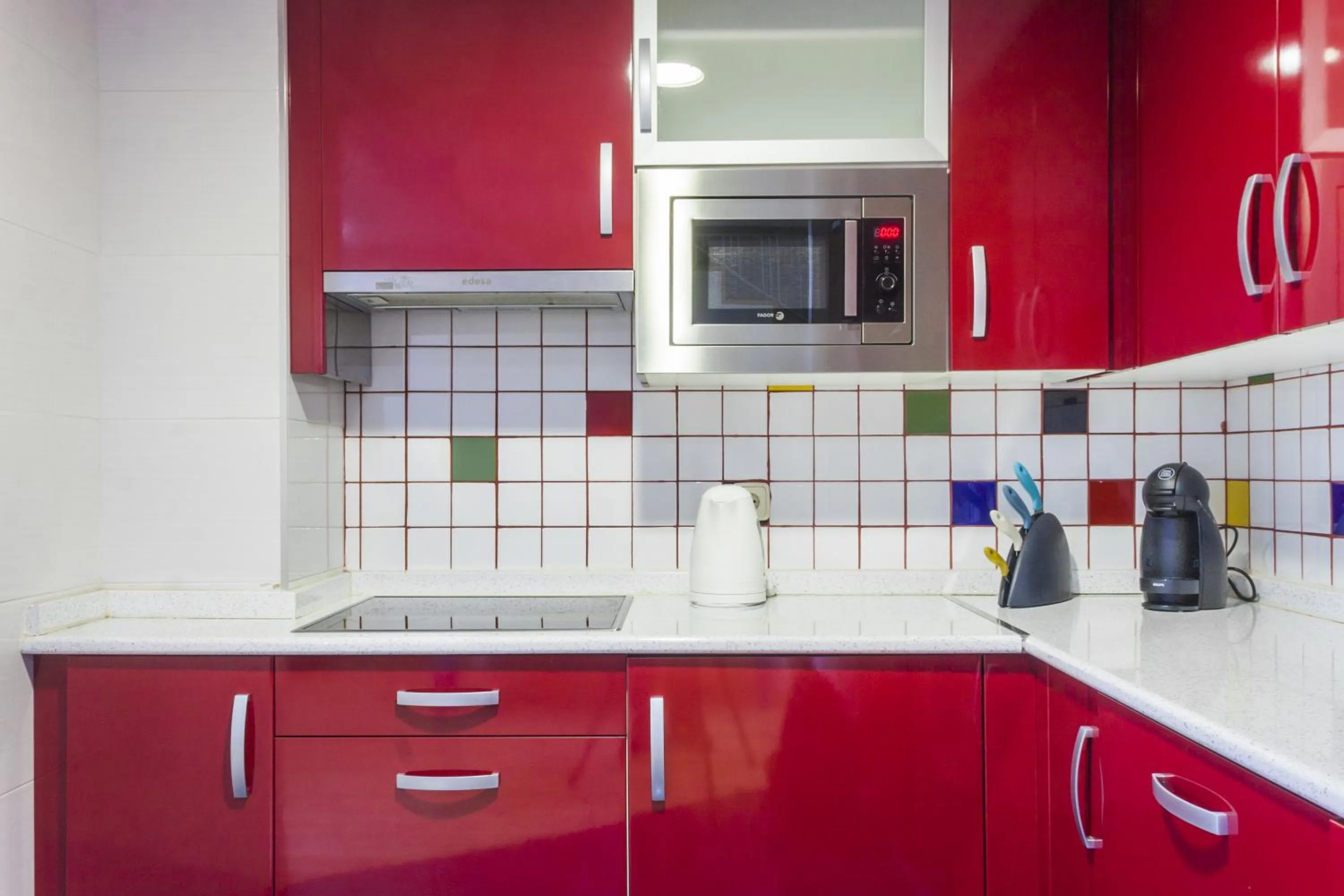 Kitchen or kitchenette in Mola Suites