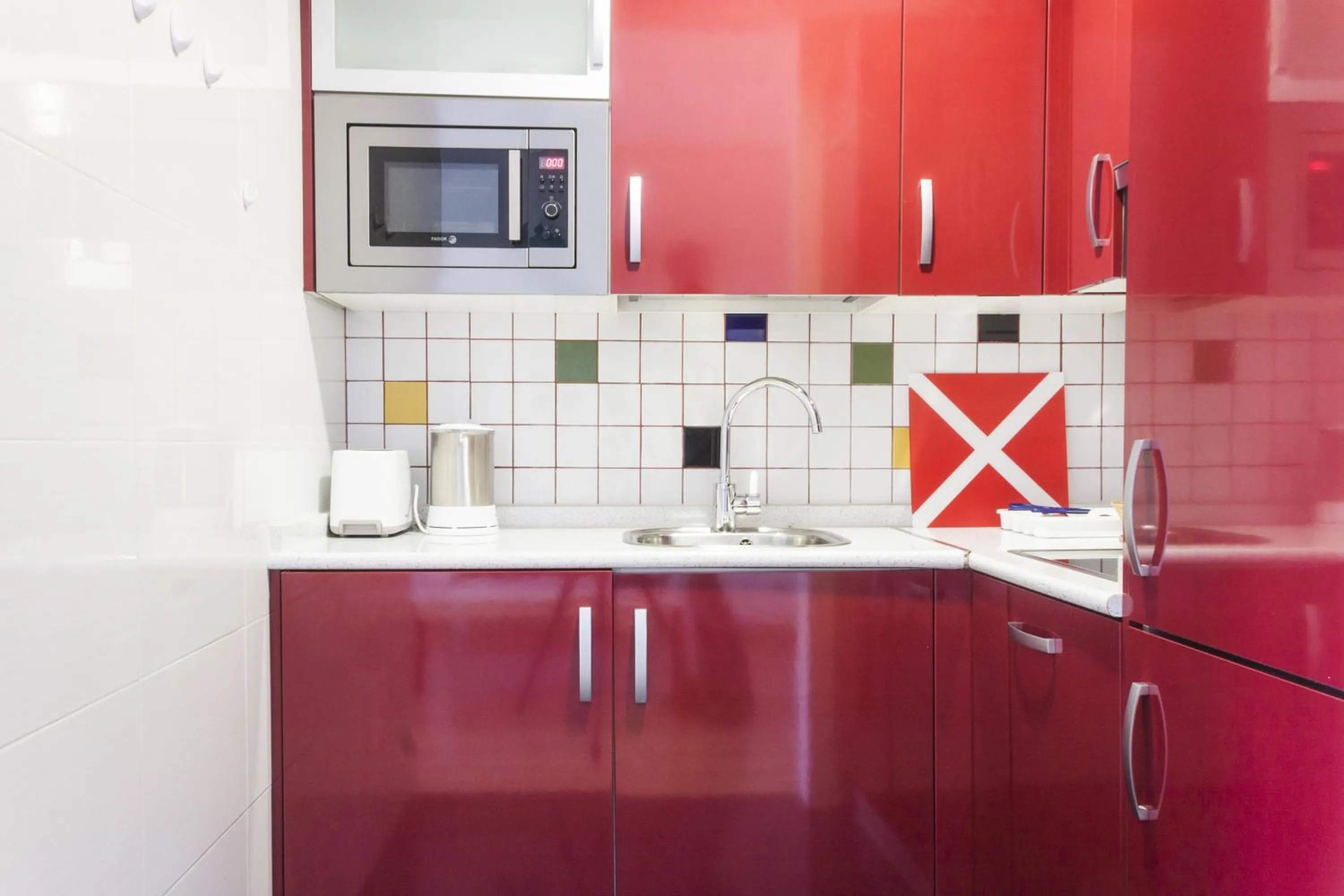 Kitchen or kitchenette in Mola Suites