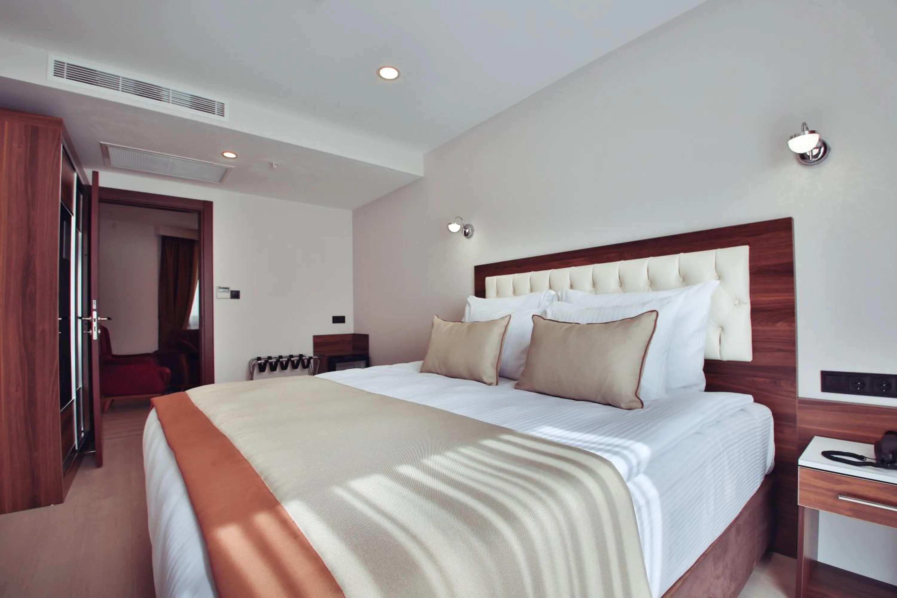 Bed in Hotel Paris Prestige