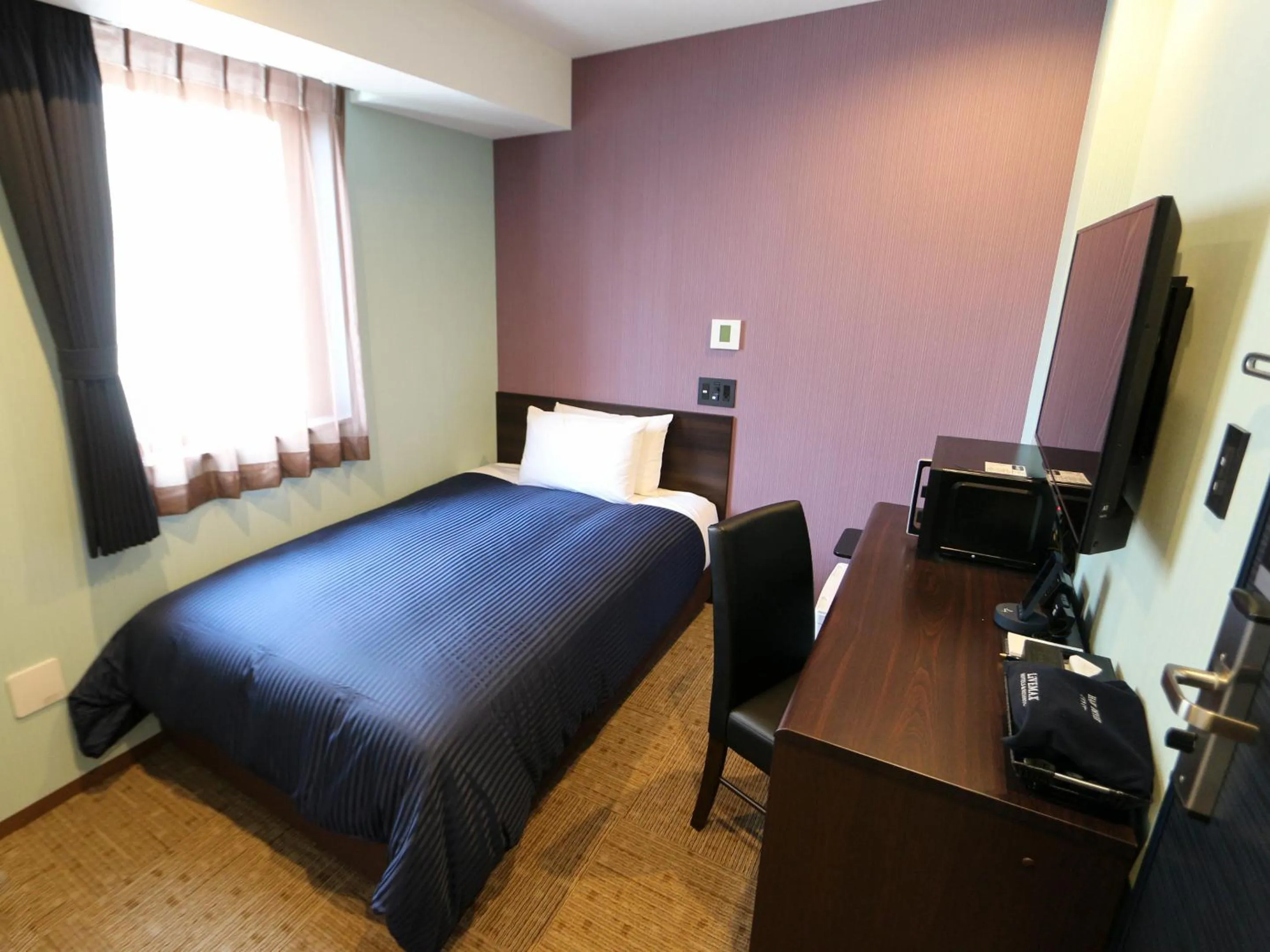 Bed in HOTEL LiVEMAX Asakusabashi-Eki Kitaguchi