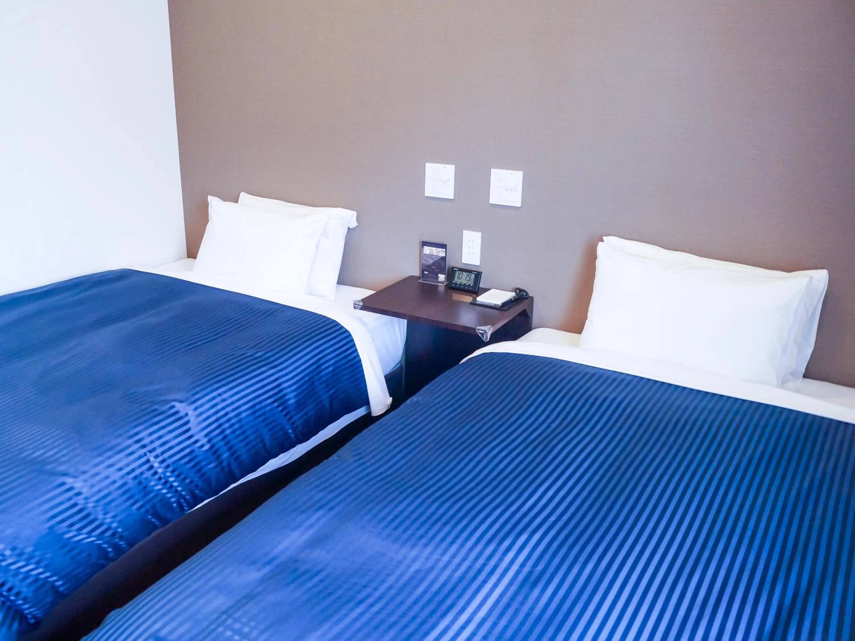 Photo of the whole room, Bed in HOTEL LiVEMAX Saitama-Asaka-Ekimae