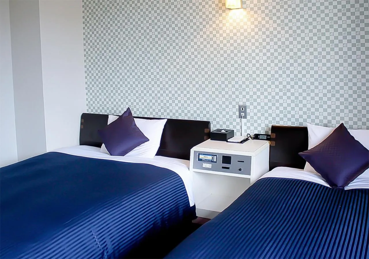 Photo of the whole room, Bed in Hotel Livemax BUDGET Kanazawa-Idaimae