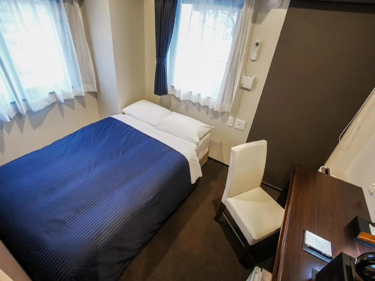 Bed in HOTEL LiVEMAX Umeda Doyama