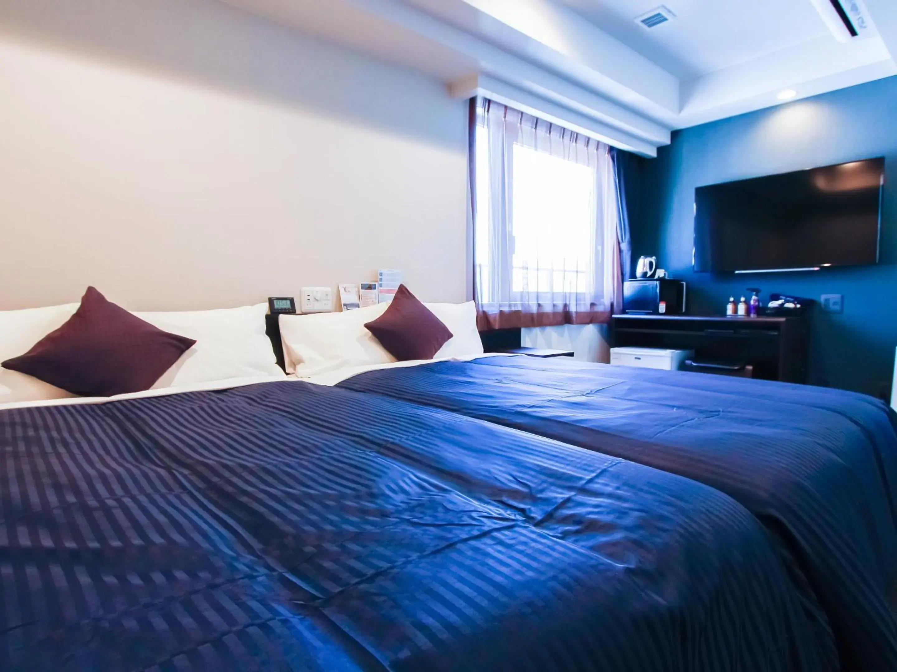 Bed in HOTEL LiVEMAX Shinsaibashi East Bed in HOTEL LiVEMAX Shinsaibashi East