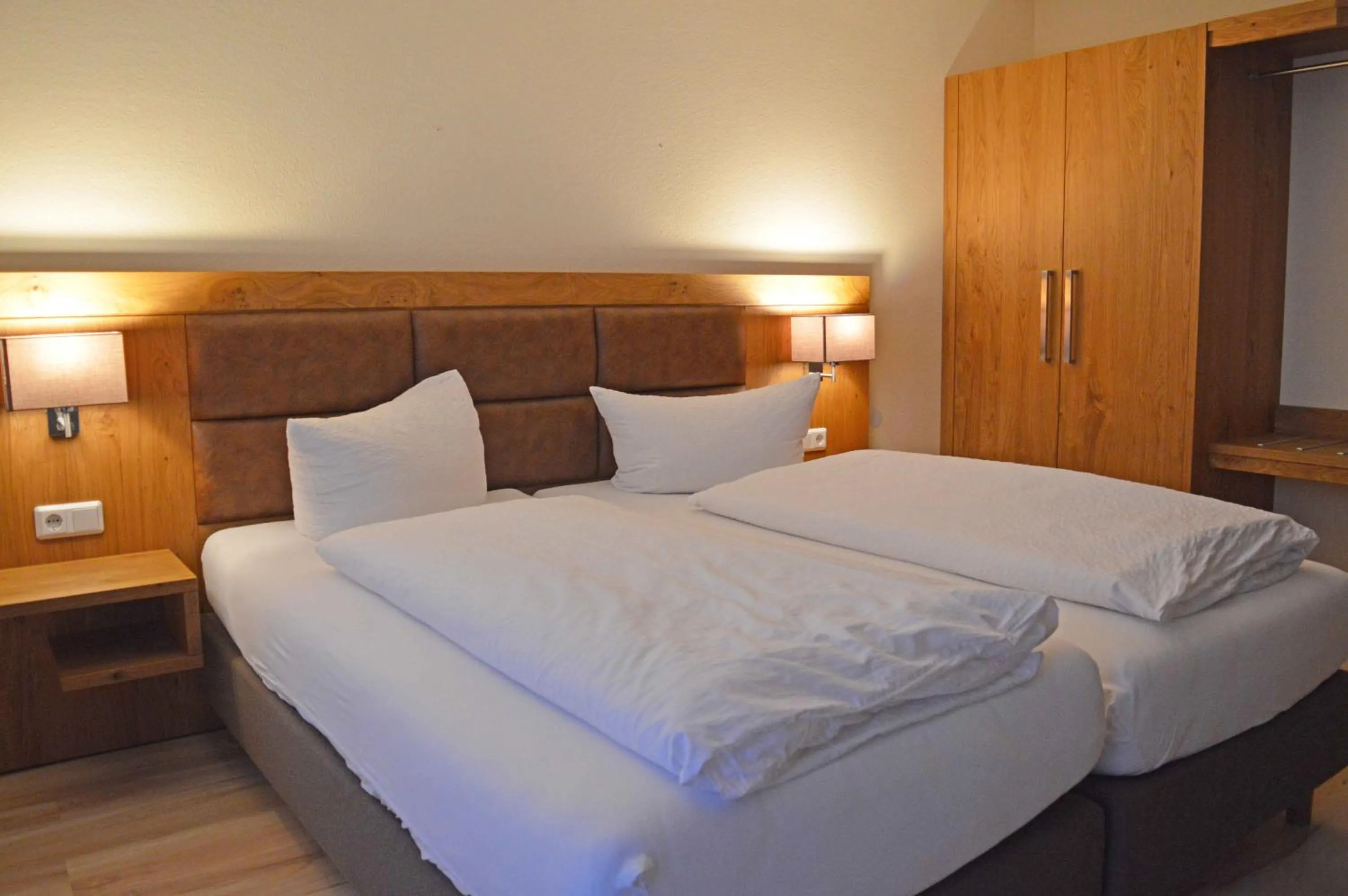 Photo of the whole room, Bed in Aparthotel Jägerhaus