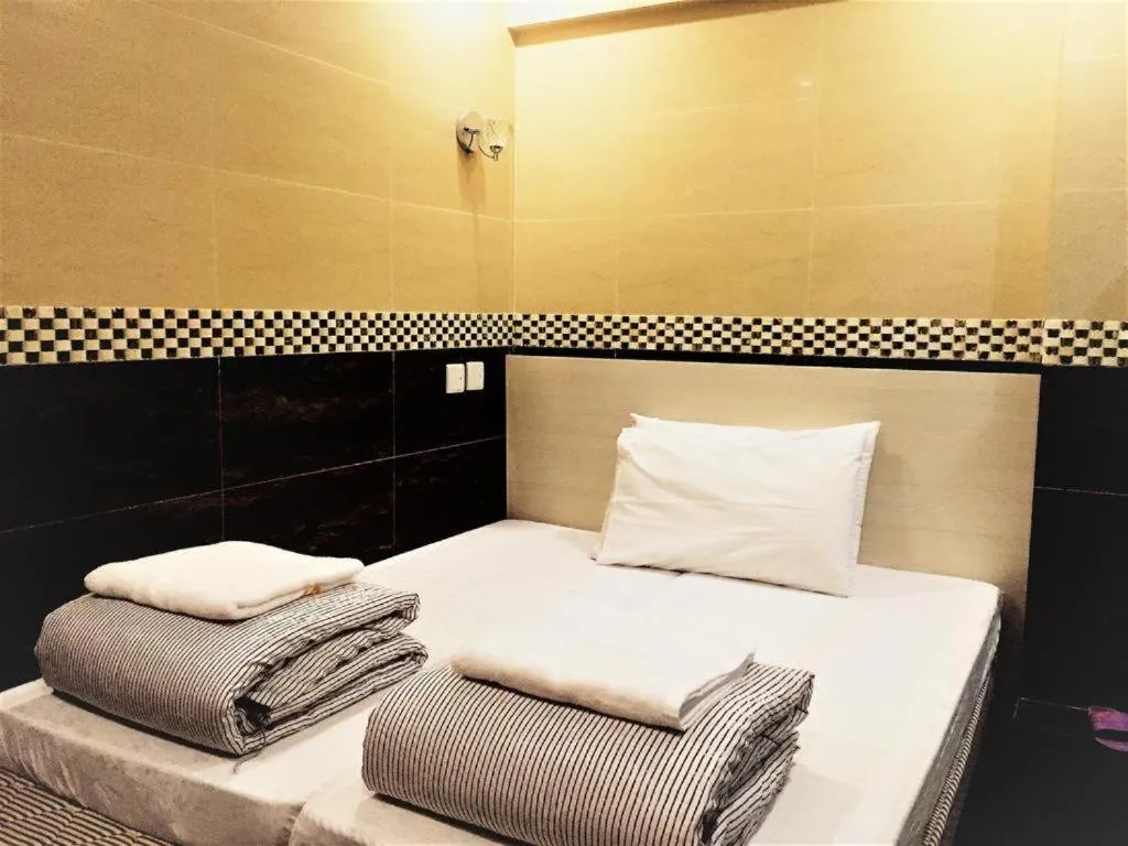Bed in New Fortunate Guest House A1