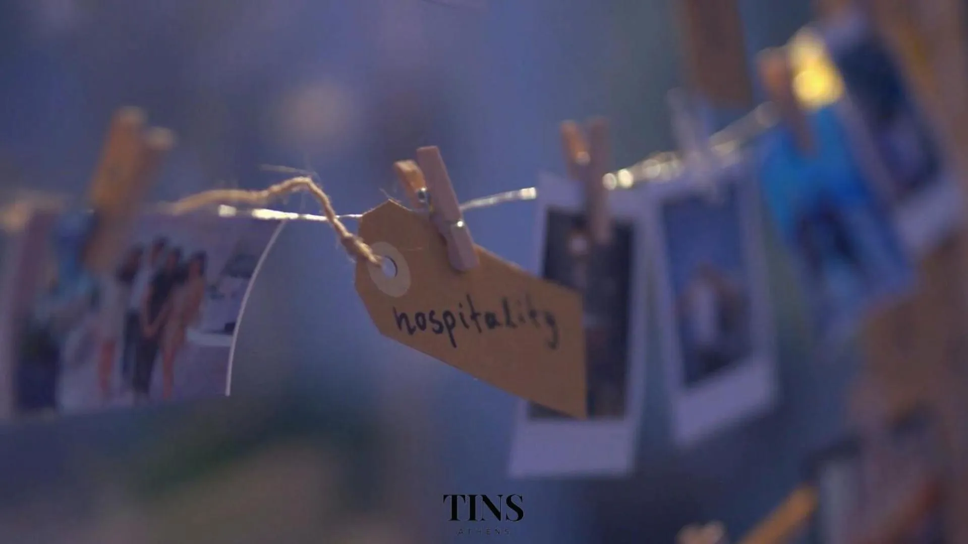 Text overlay in Tins Hotel City - Athens