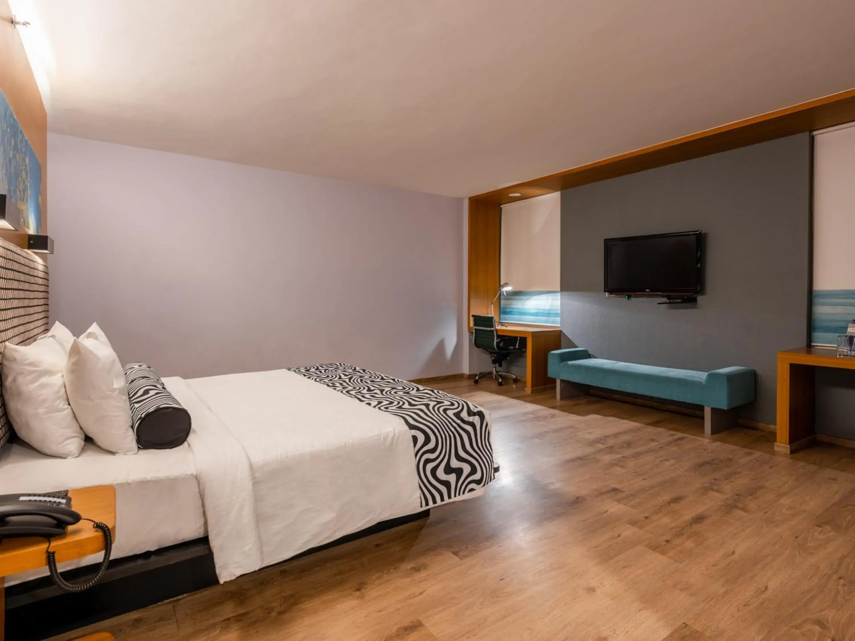 Luxury Triple Room in Sunday Hotel by CheckIn Chandigarh Zirakpur Luxury Triple Room in Sunday Hotel by CheckIn Chandigarh Zirakpur