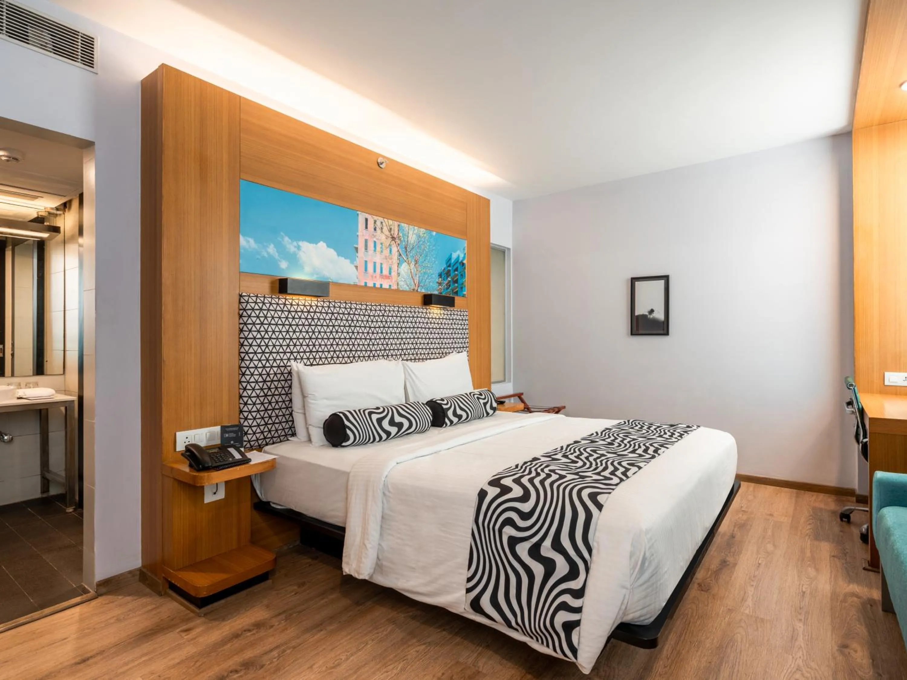 Bed in Sunday Hotel Chandigarh Zirakpur