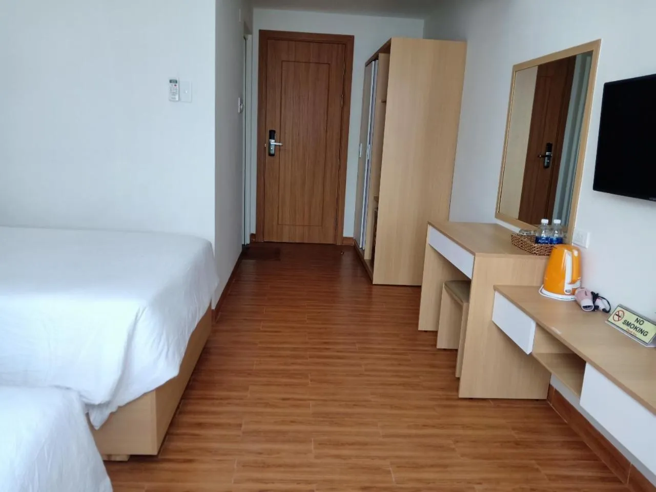 Seating area, Bed in Galaxy Hotel