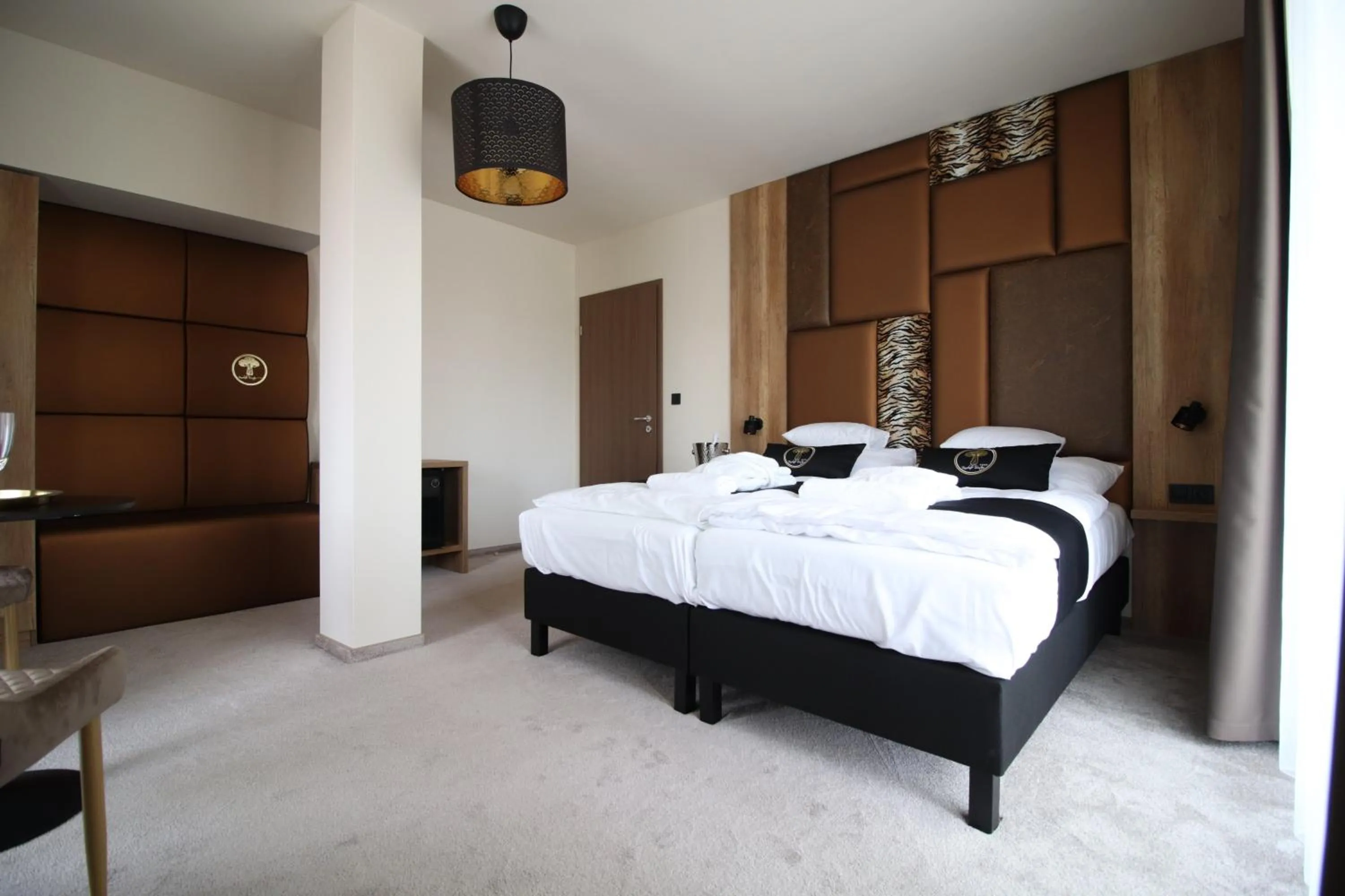 Photo of the whole room, Bed in Baobab Suites