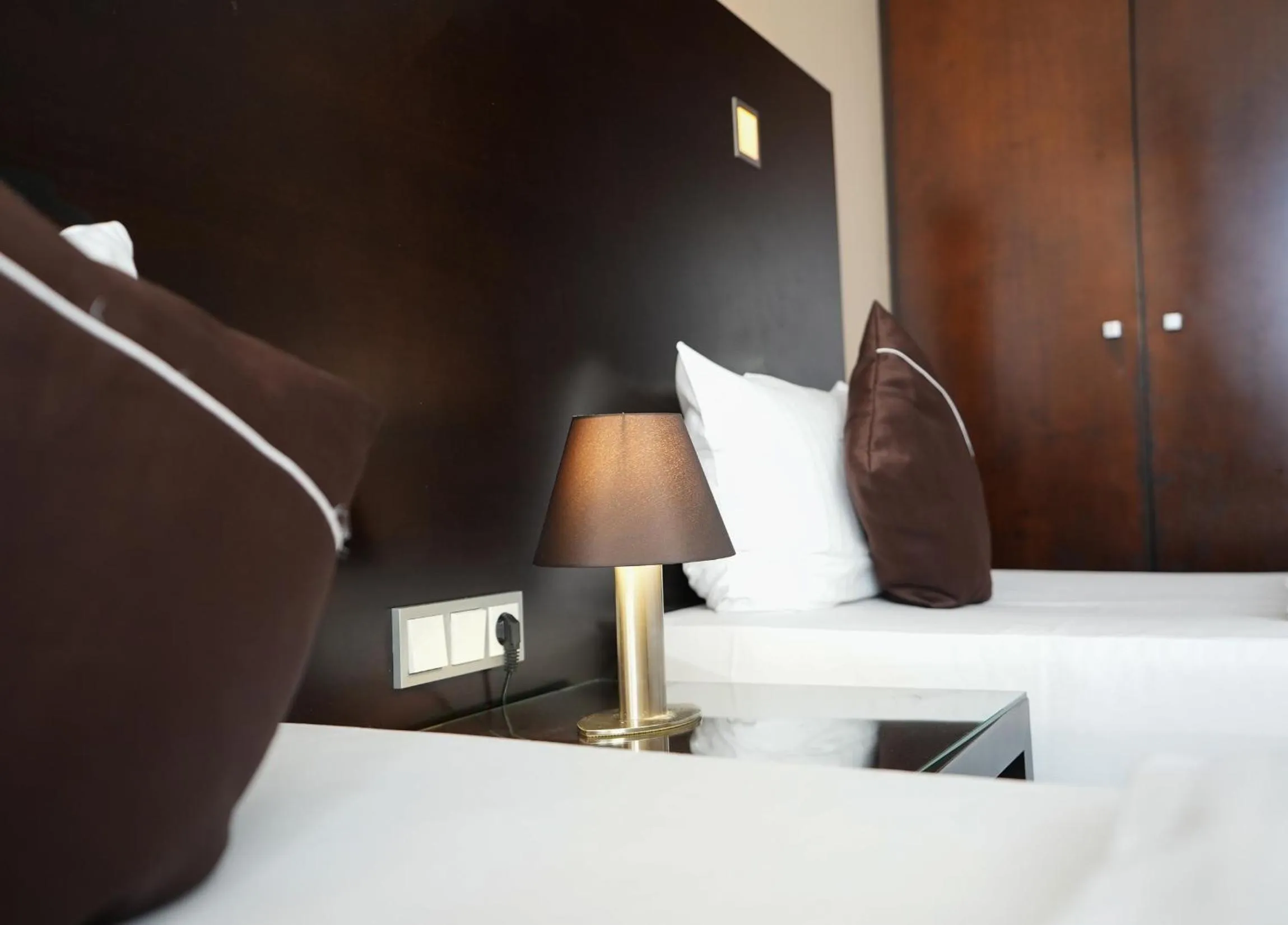 Photo of the whole room, Bed in Hotel Lumière an der Messe