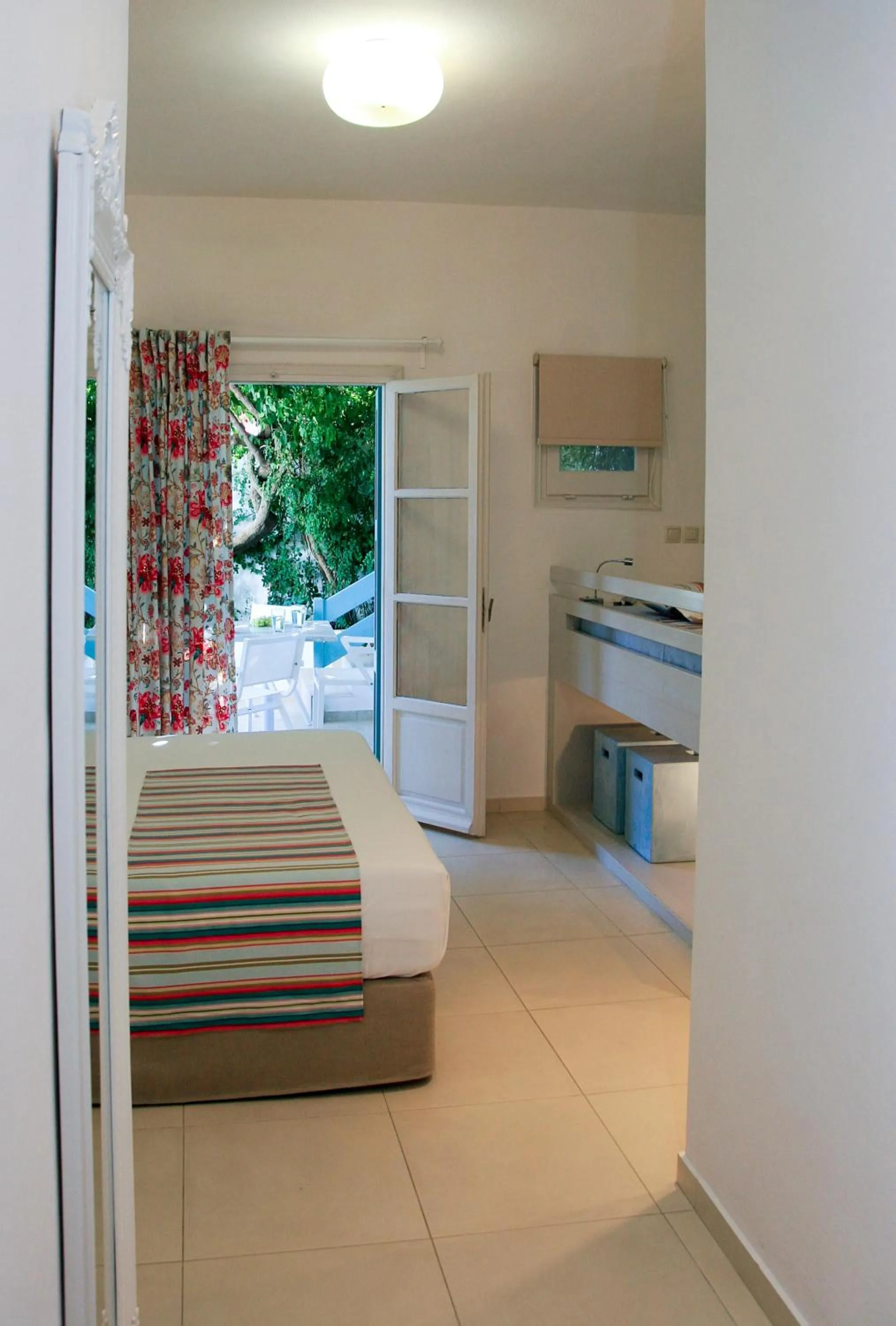 Photo of the whole room, Bed in Aphrodite Studios