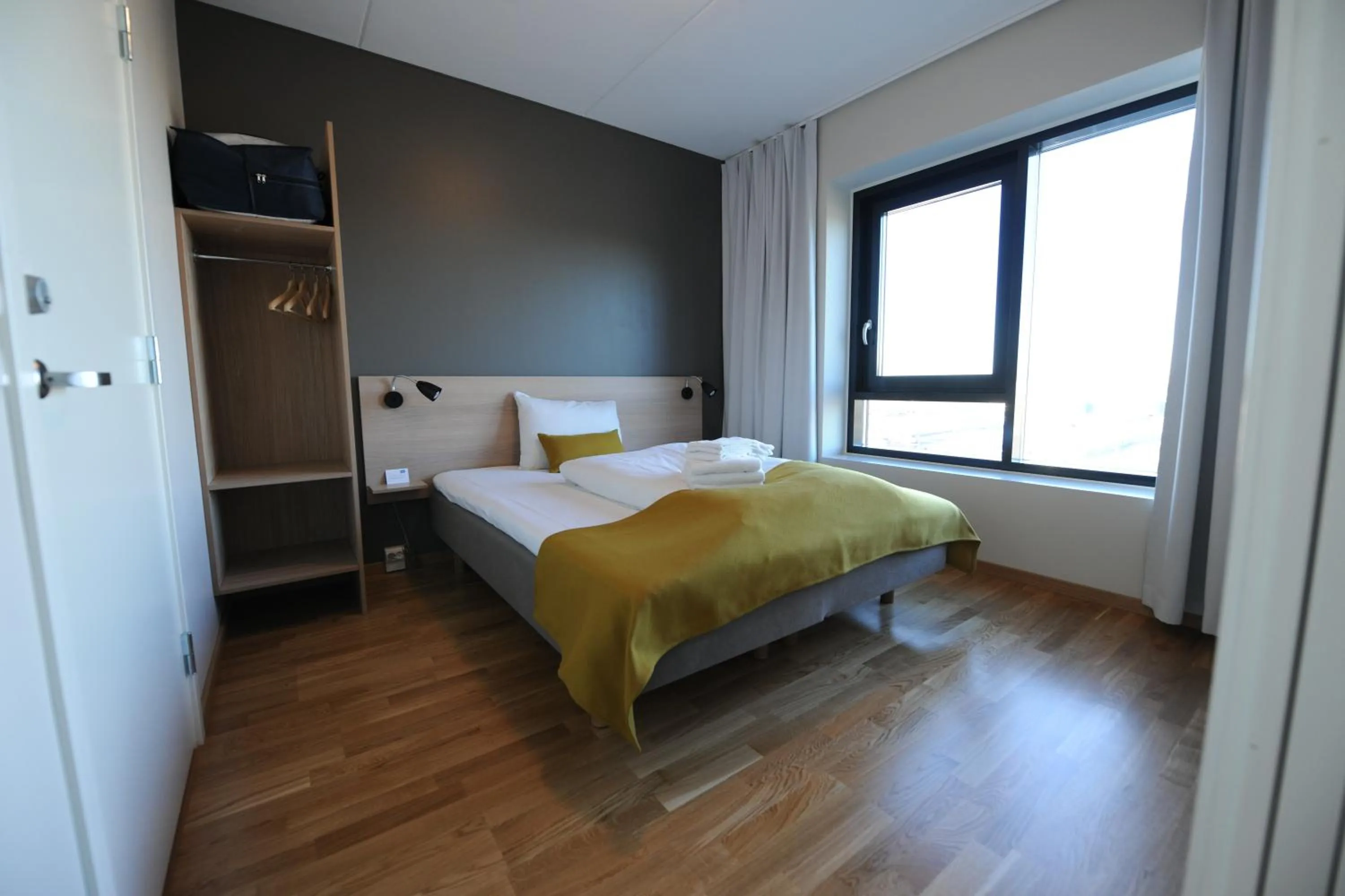 Bed in Tananger Apartment Hotel