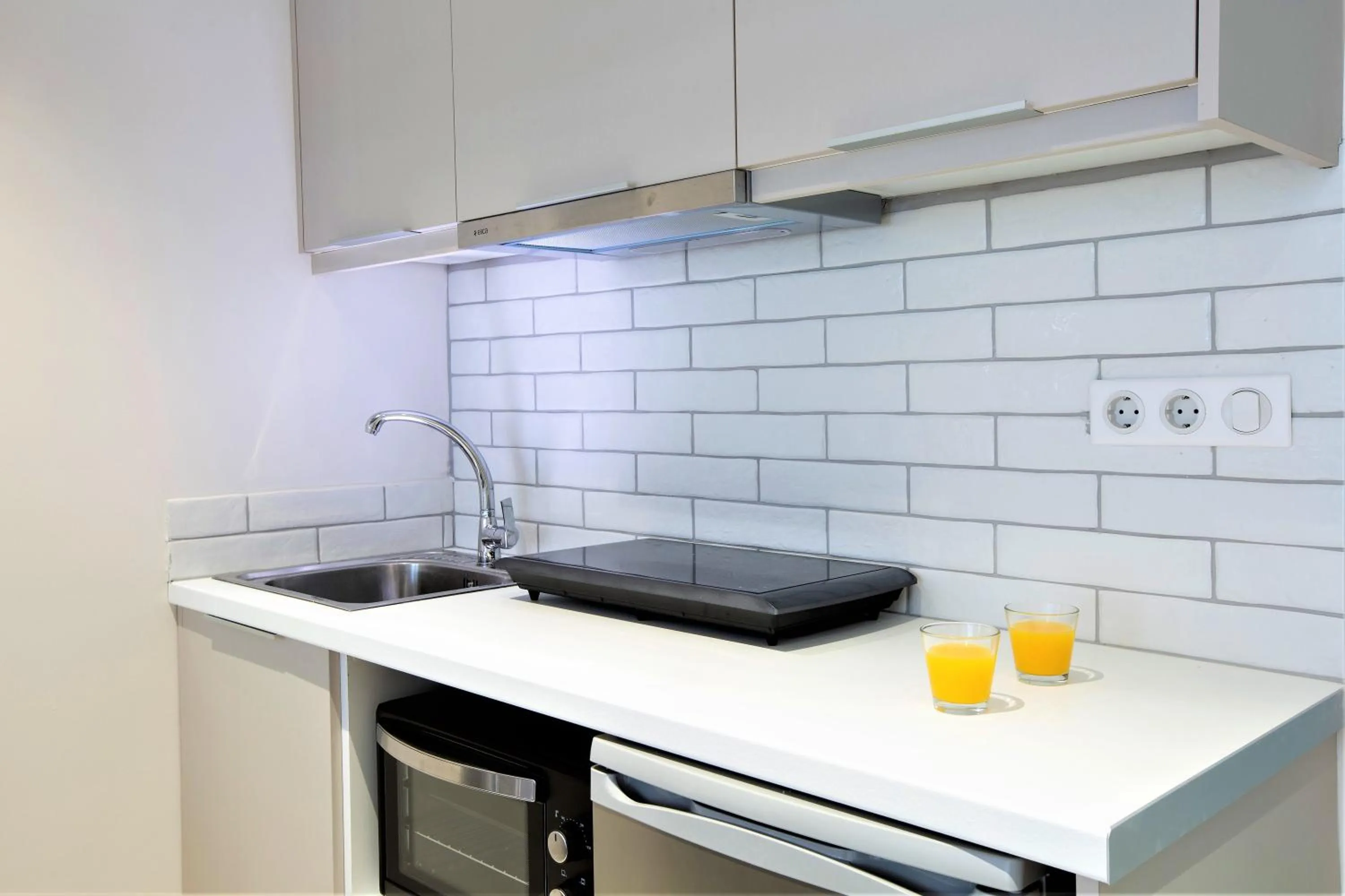 Kitchen or kitchenette in Odyssey Hotel