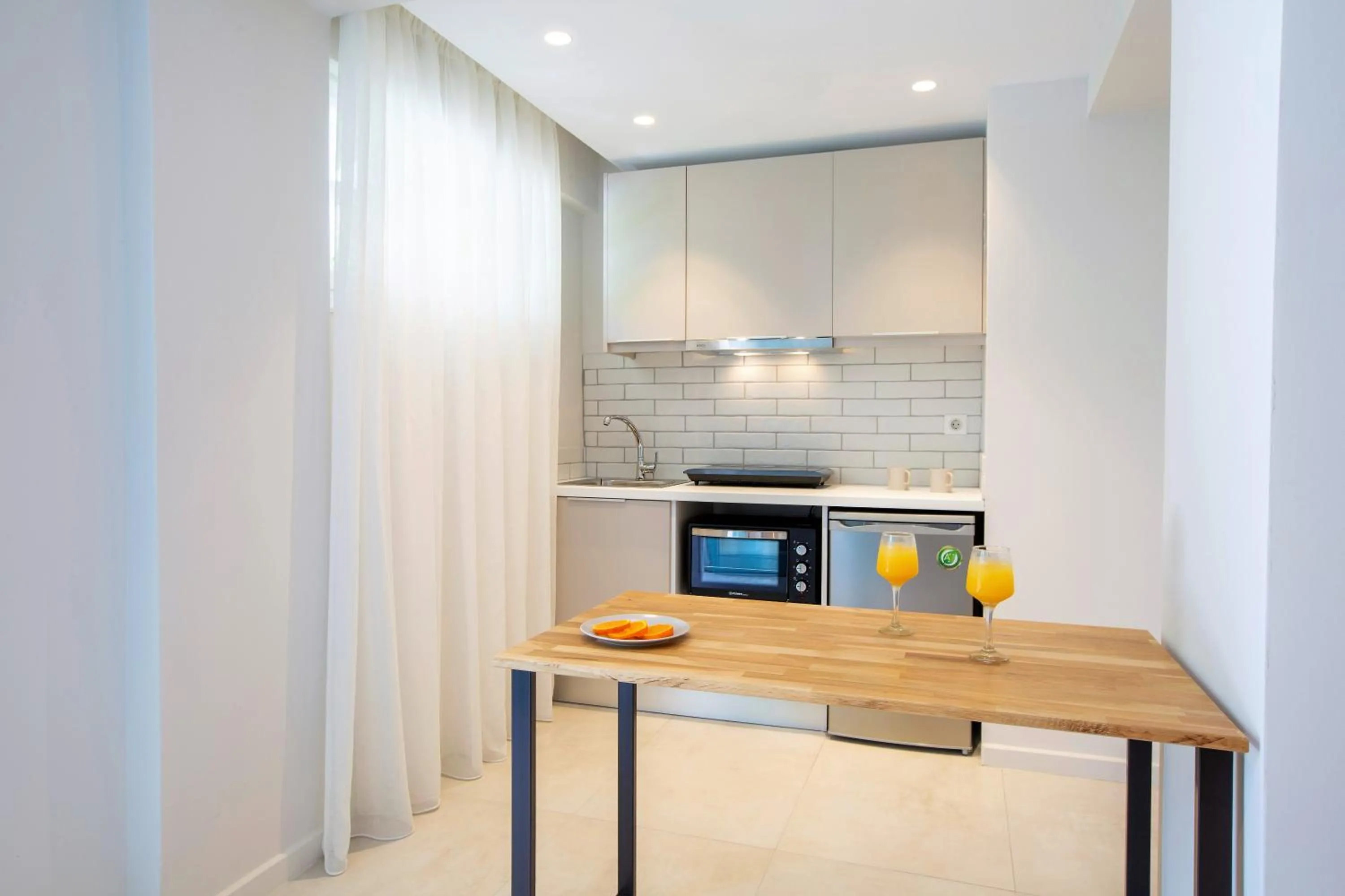 Kitchen or kitchenette in Odyssey Hotel