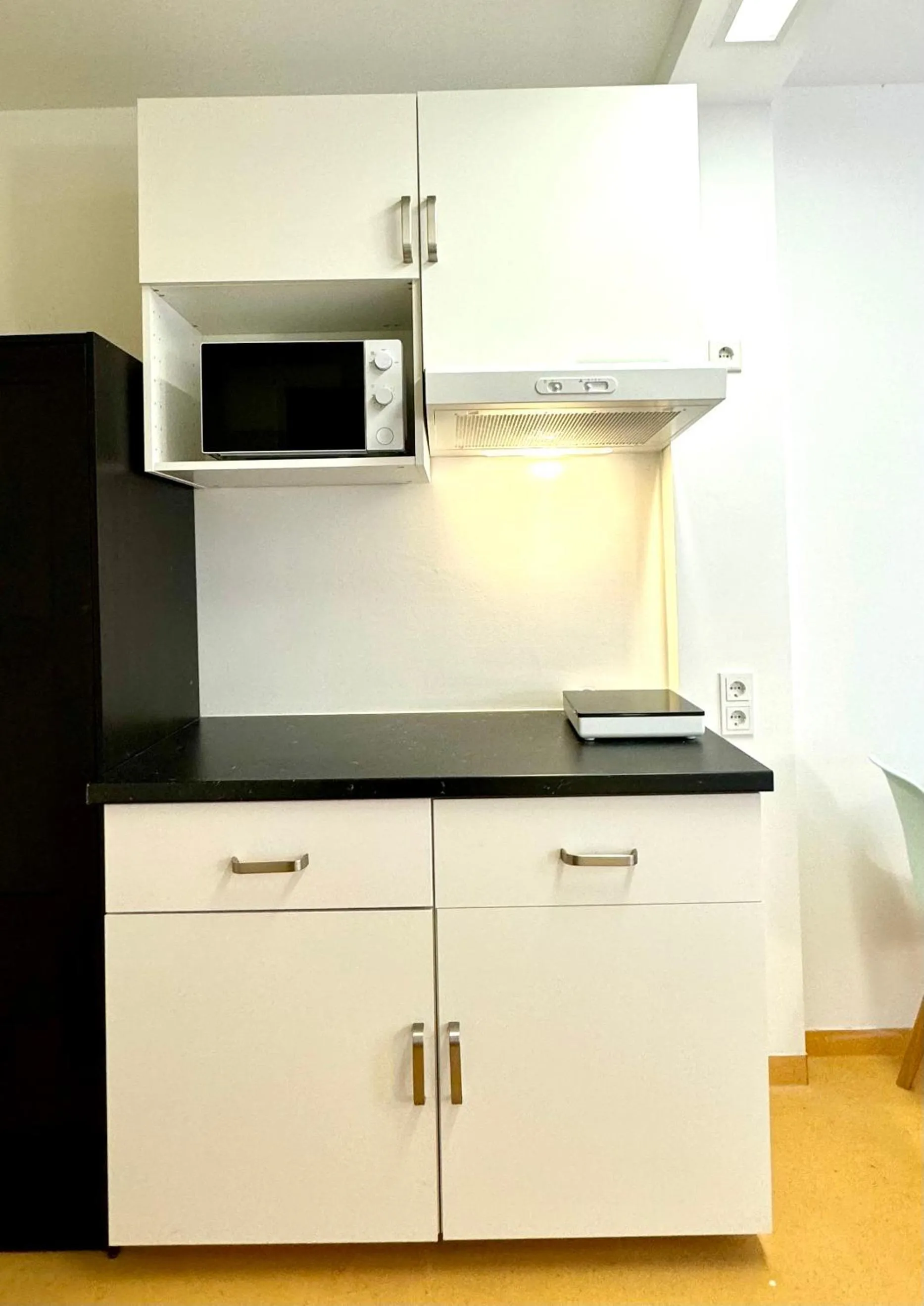 Kitchen or kitchenette in A&T Hotel & Hostel