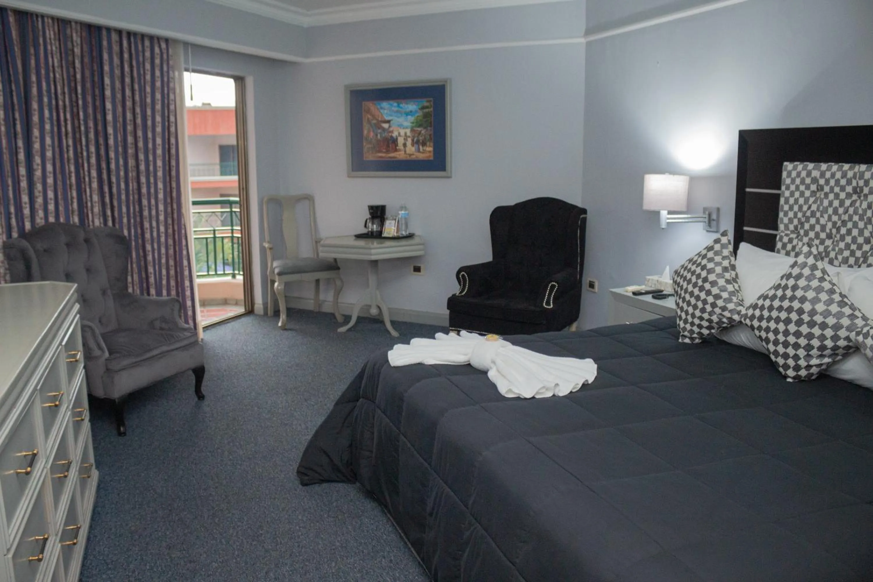 Living room, Bed in Nk Hotel Nekié Tepic