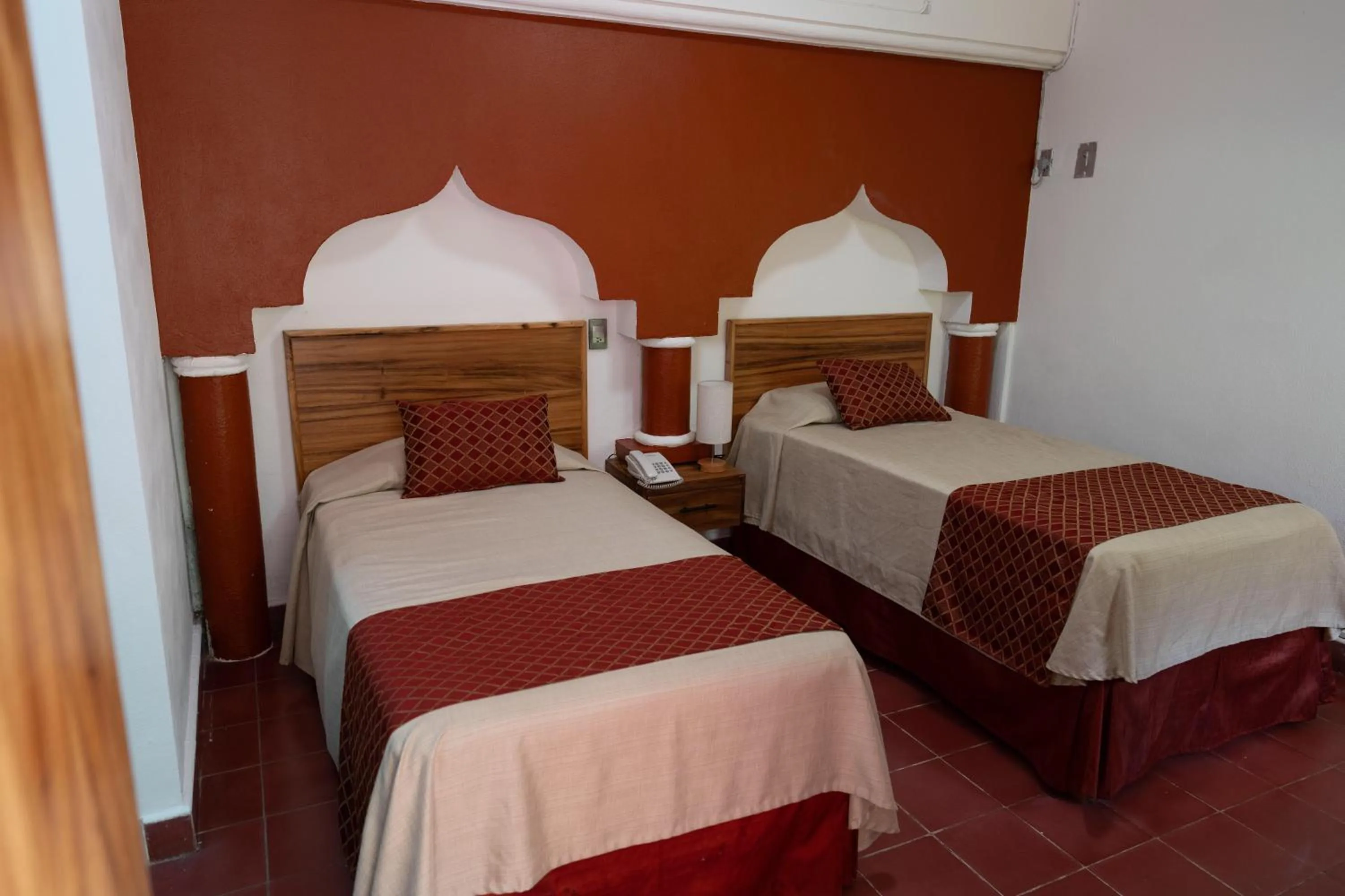 Photo of the whole room, Bed in Hotel Encino Malecón Centro Puerto Vallarta