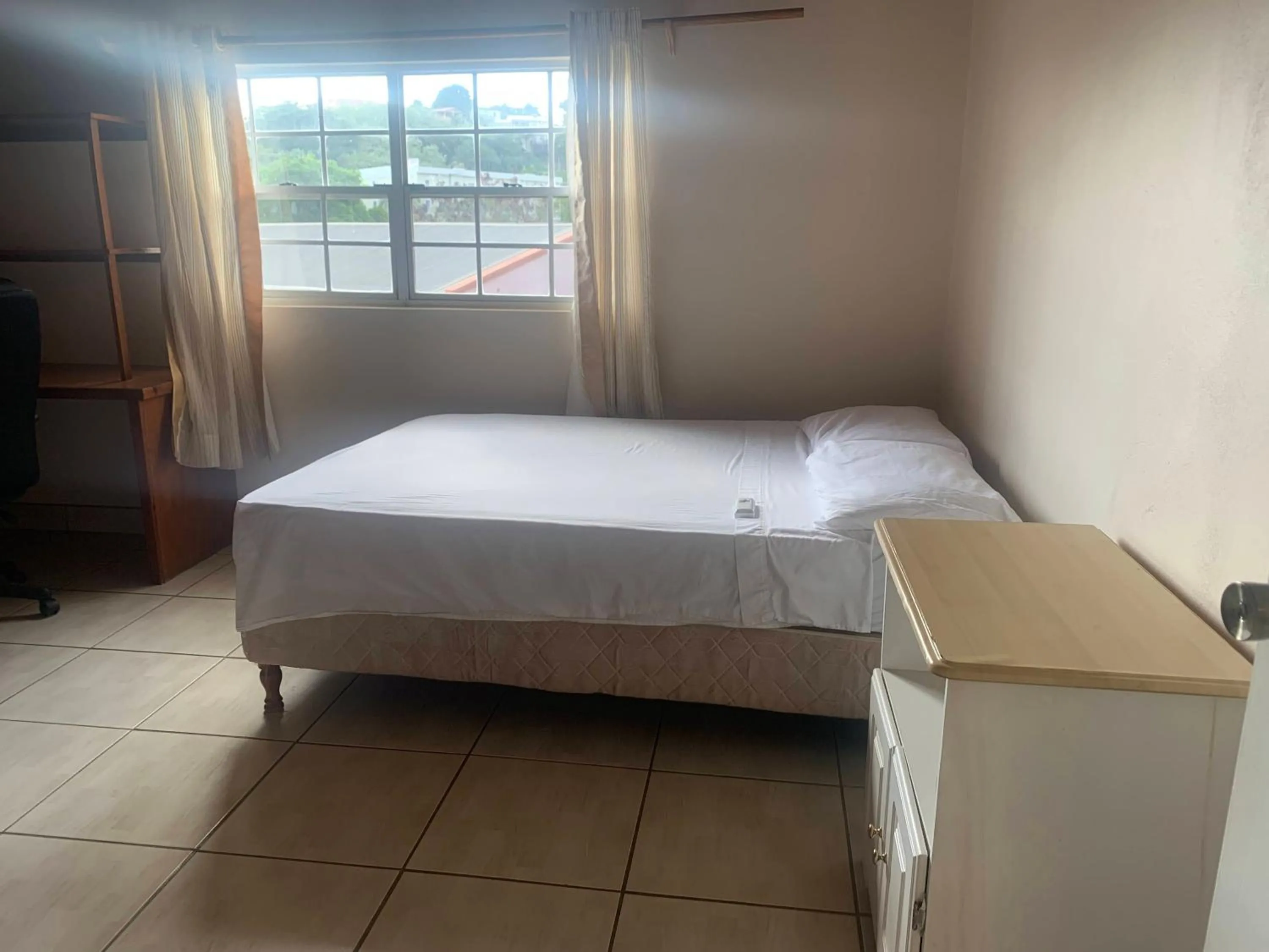 Bed in Cool Running Apartments