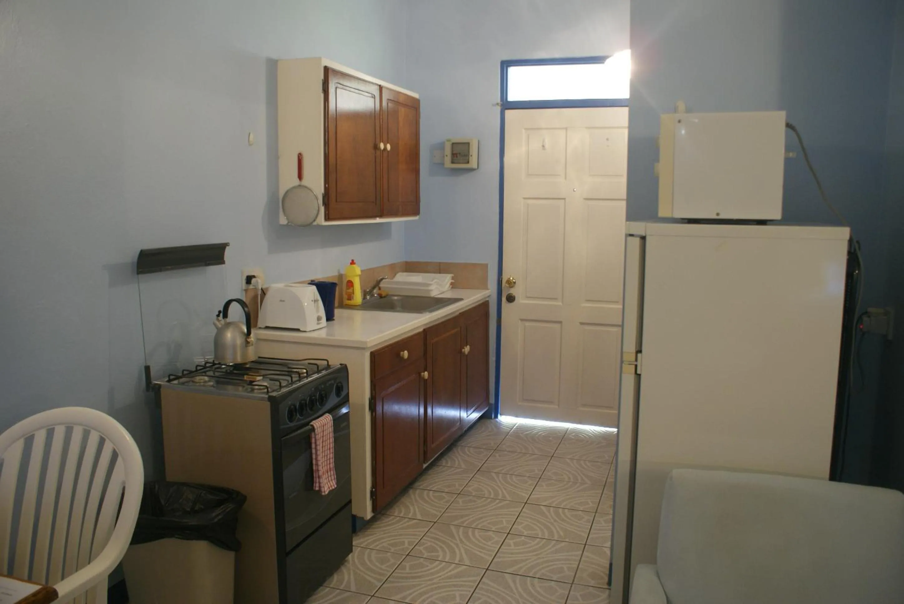 Kitchen or kitchenette in Cool Running Apartments