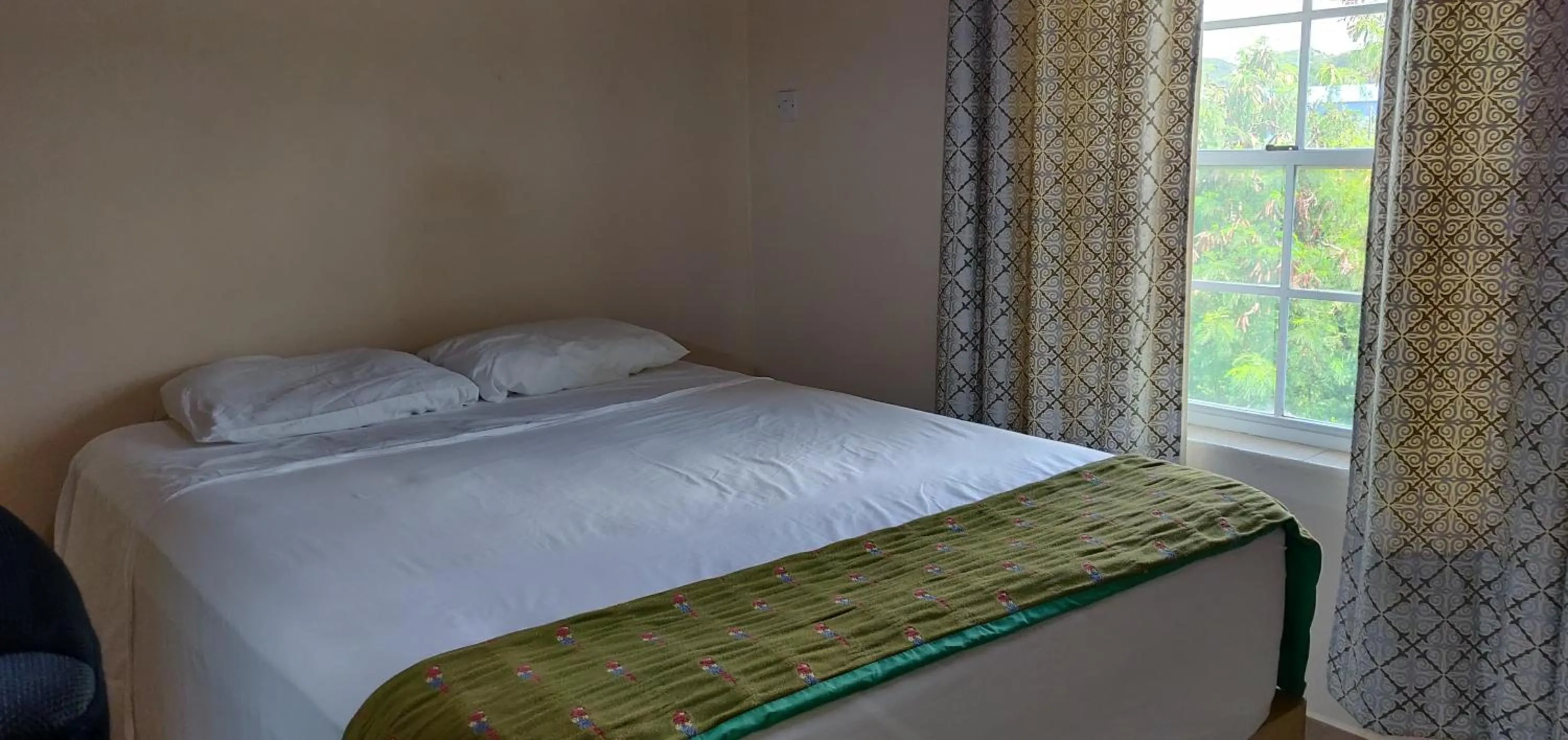 Bed in Cool Running Apartments