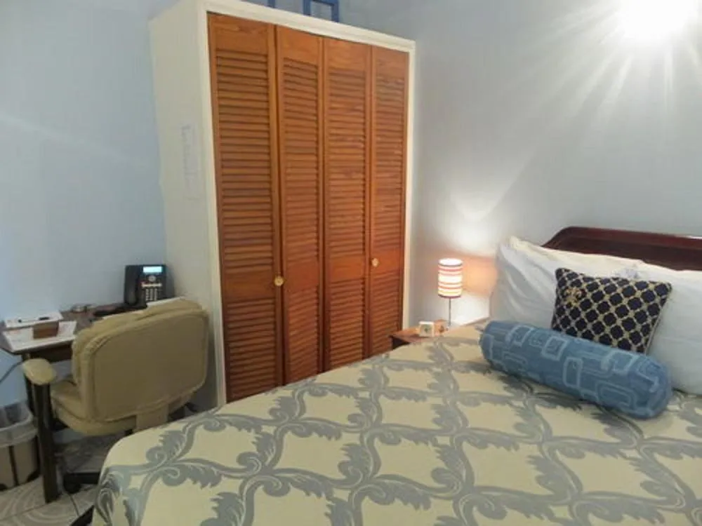 wardrobe, Bed in Cool Running Apartments