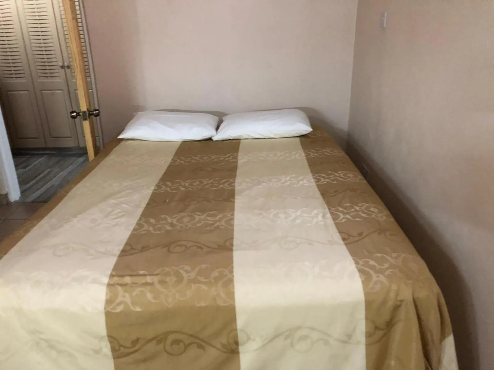 Bed in Cool Running Apartments