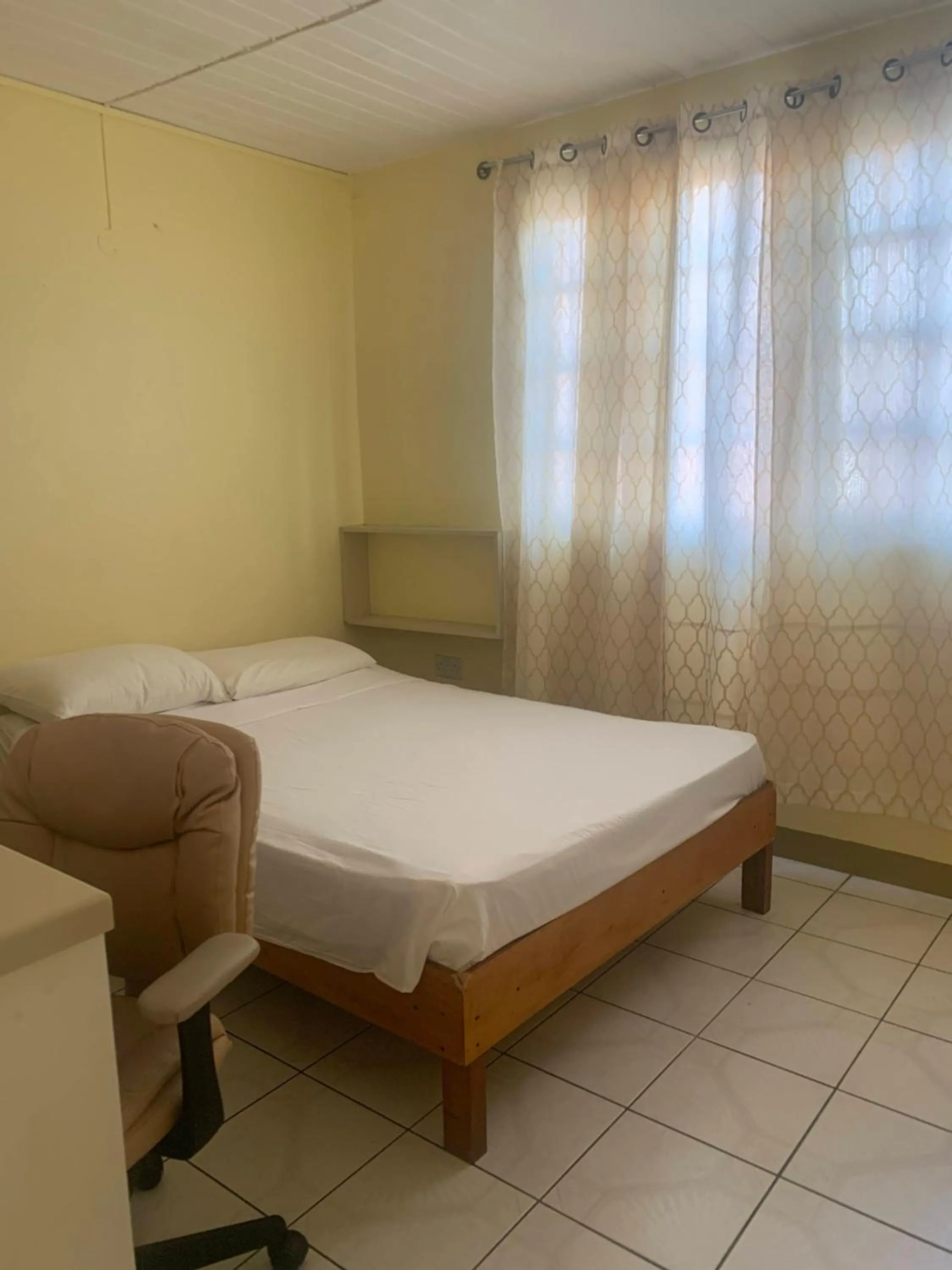 Bed in Cool Running Apartments