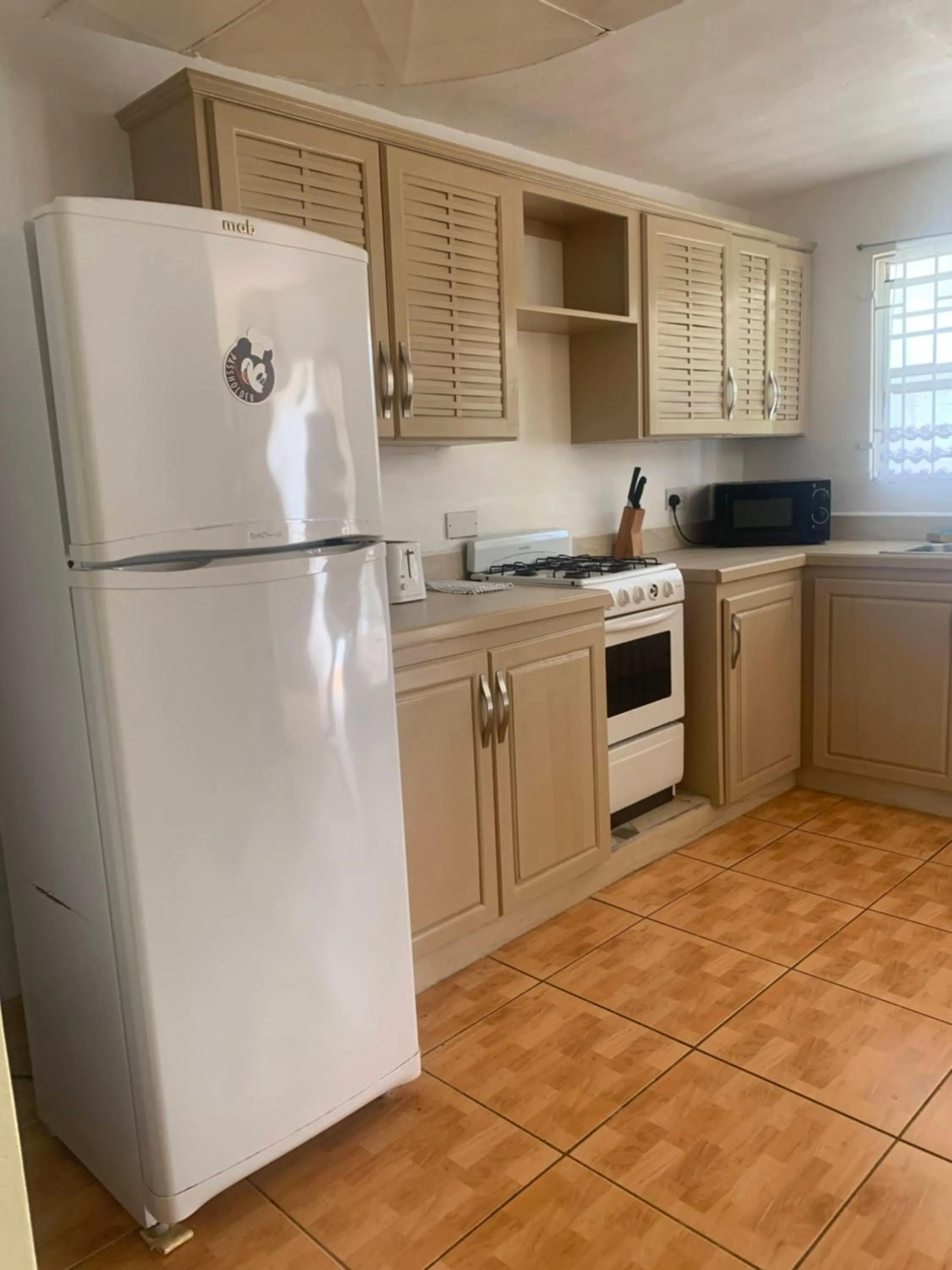 Kitchen or kitchenette in Cool Running Apartments